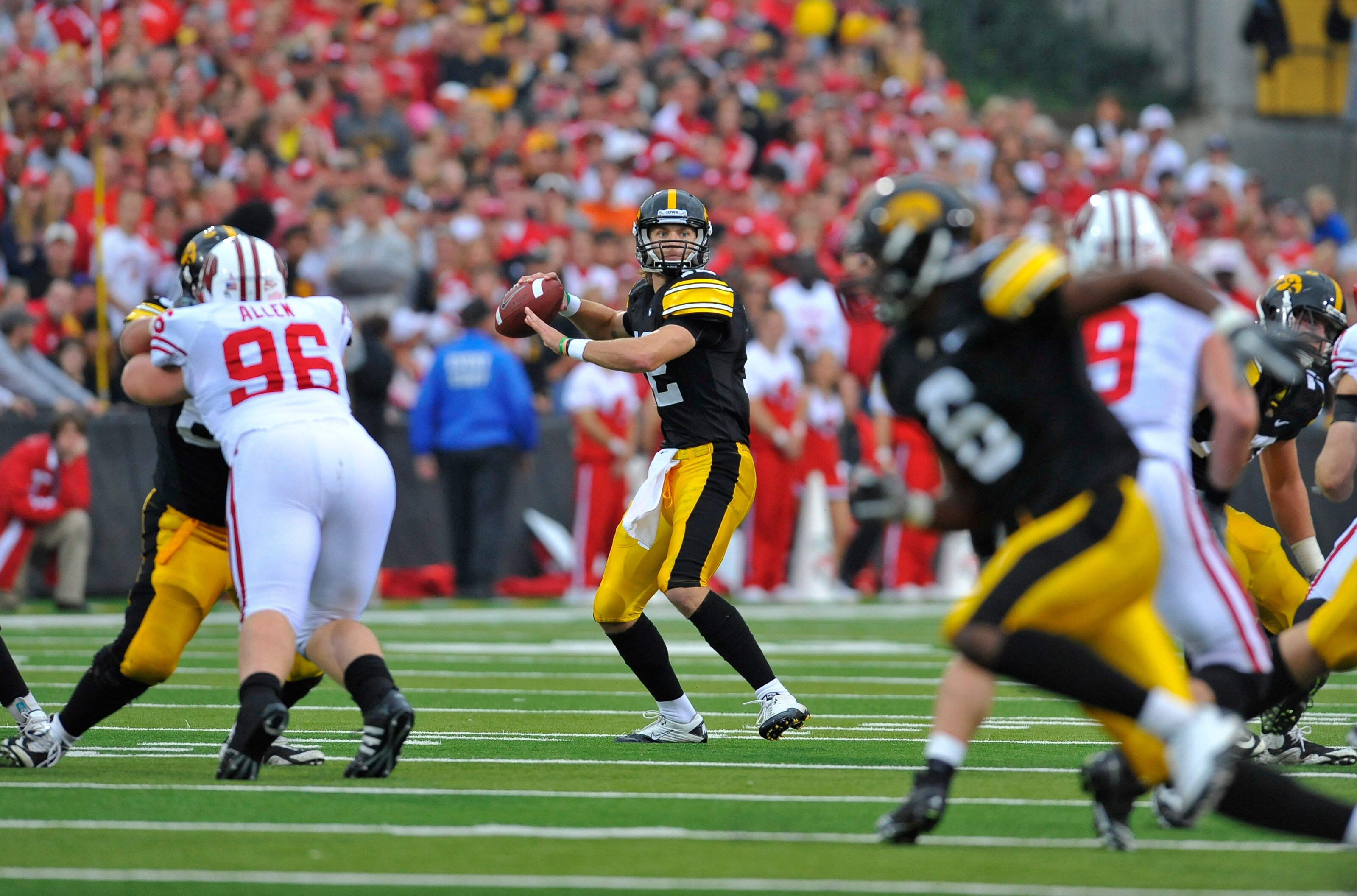 IOWA CITY, IA - OCTOBER 23- Quarterback Ricky Stanzi #12 of the University of Iowa Hawkeyes throws under pressure from the Wisconsin Badgers during the second half of play at Kinnick Stadium on October 23, 2010 in Iowa City, Iowa. Wisconsin won 31-30 over