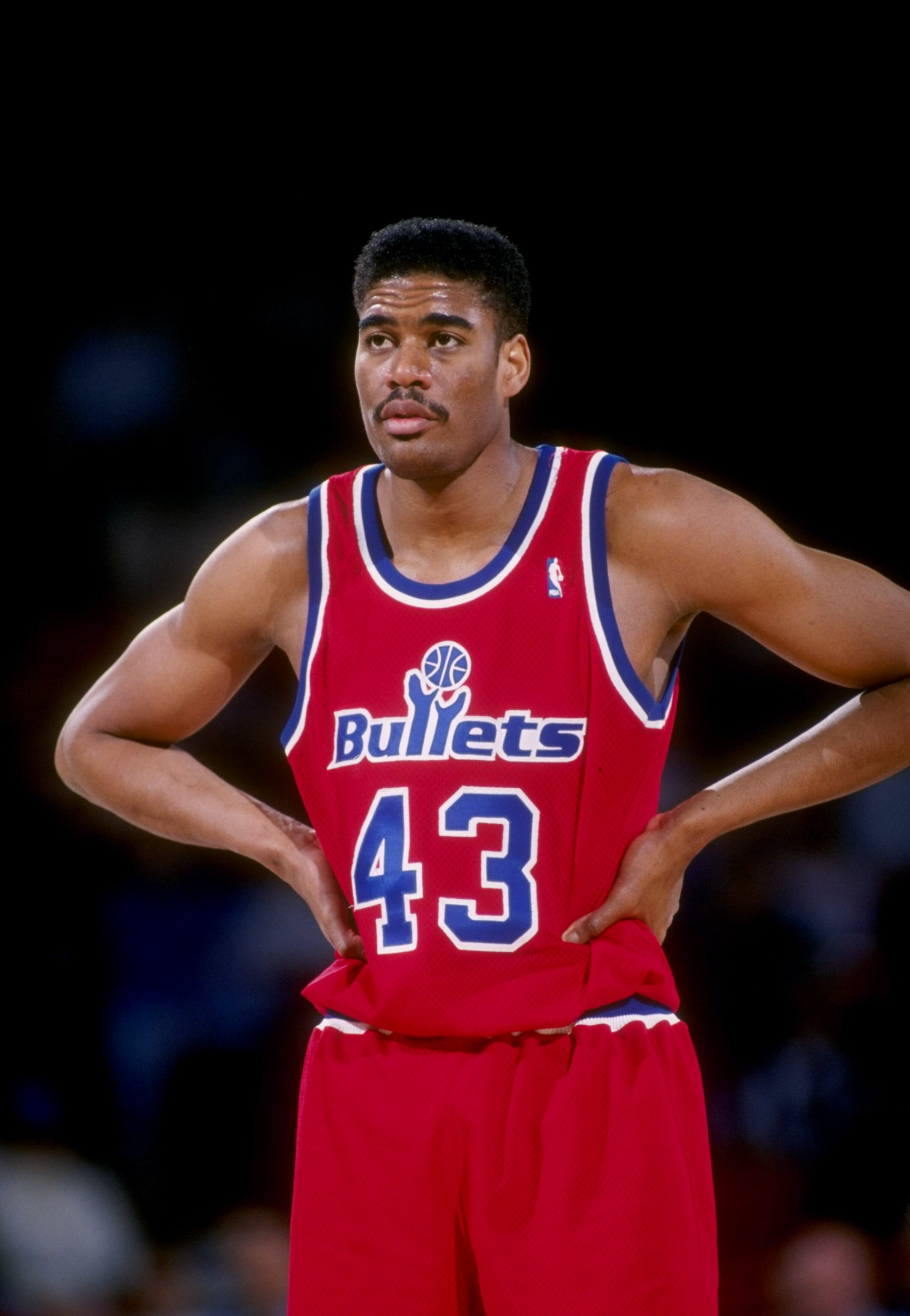 1993:  Center Pervis Ellison of the Washington Bullets stands on the court during a game against the Denver Nuggets at the McNichols Sports Arena in Denver, Colorado.   Mandatory Credit: Tim de Frisco  /Allsport