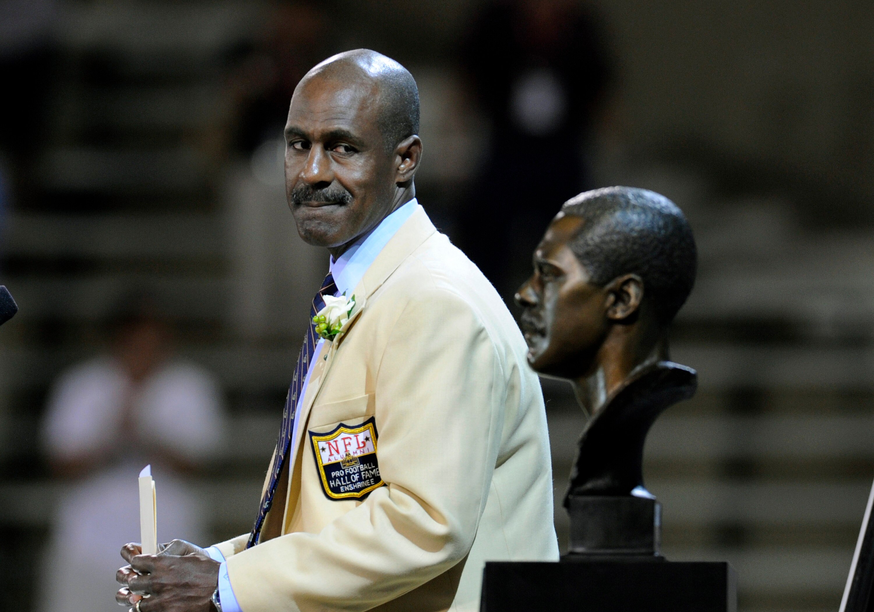 CANTON, OH - AUGUST 2:  Art Monk formerly of the Washington Redskins looks at his bust during his induction during the  Class of 2008 Pro Football Hall of Fame Enshrinement Ceremony at Fawcett Stadium on August 2, 2008 in Canton, Ohio.   (Photo by Al Mess