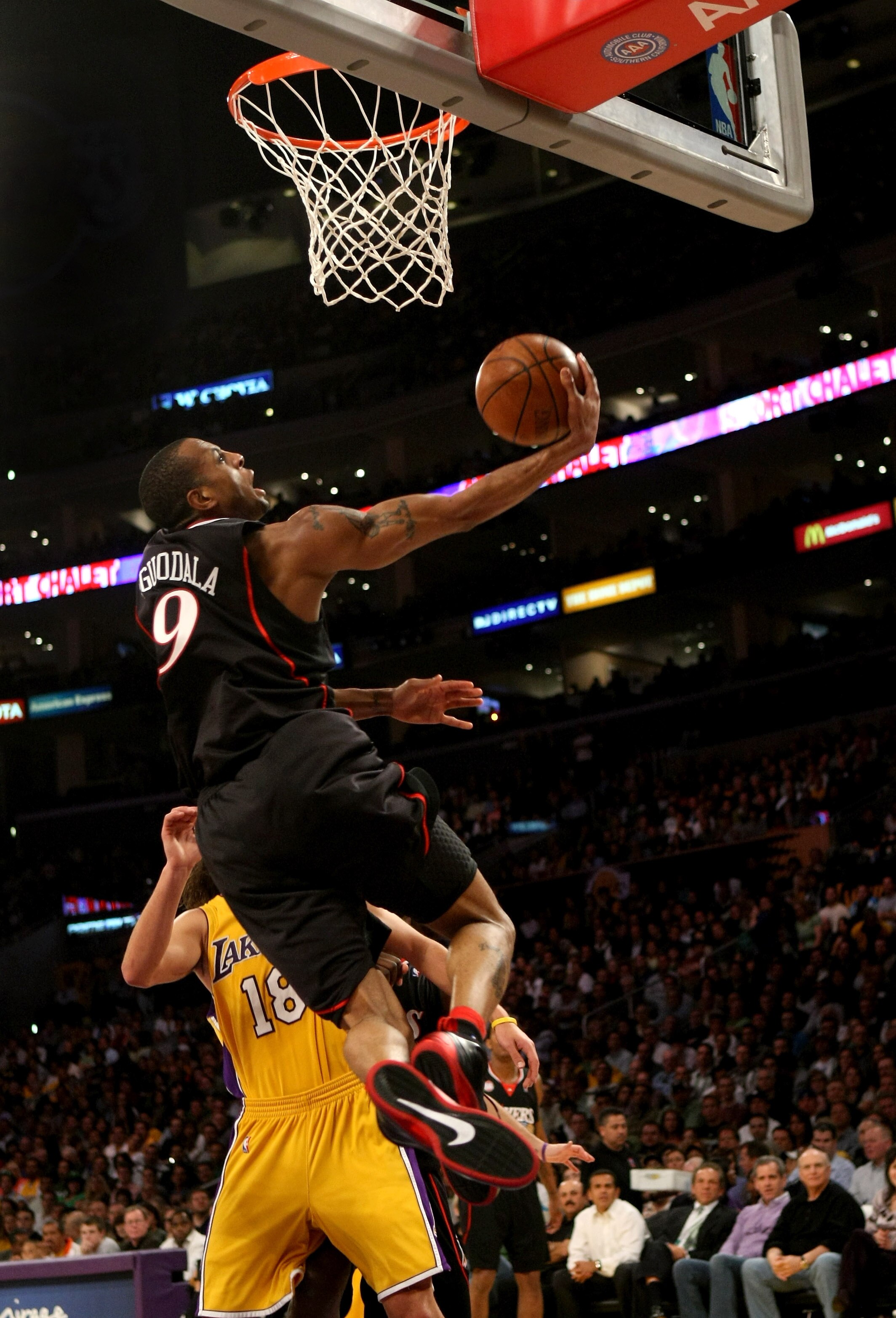 LOS ANGELES - MARCH 17:  Andre Iguadala #9 of the Philadelphia 76ers shoots over Sasha Vujacic #18 of the Los Angeles Lakers on March 17, 2009 at Staples Center in Los Angeles, California.  The 76ers won 94-93.   NOTE TO USER: User expressly acknowledges
