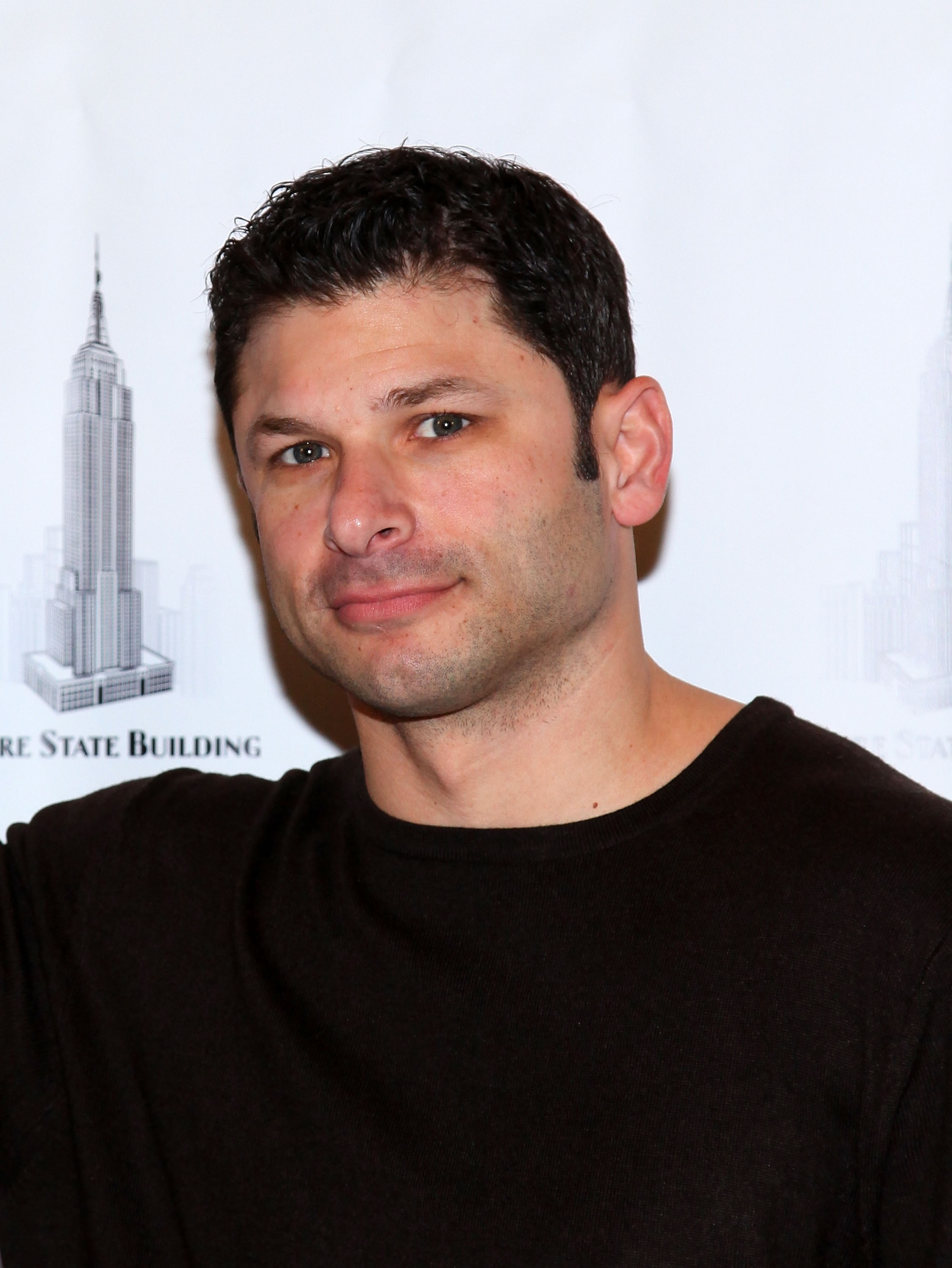 NEW YORK - JANUARY 15:  Former New York Jets football player Wayne Chrebet lights The Empire State Building on January 15, 2010 in New York City.  (Photo by Mike Coppola/Getty Images)