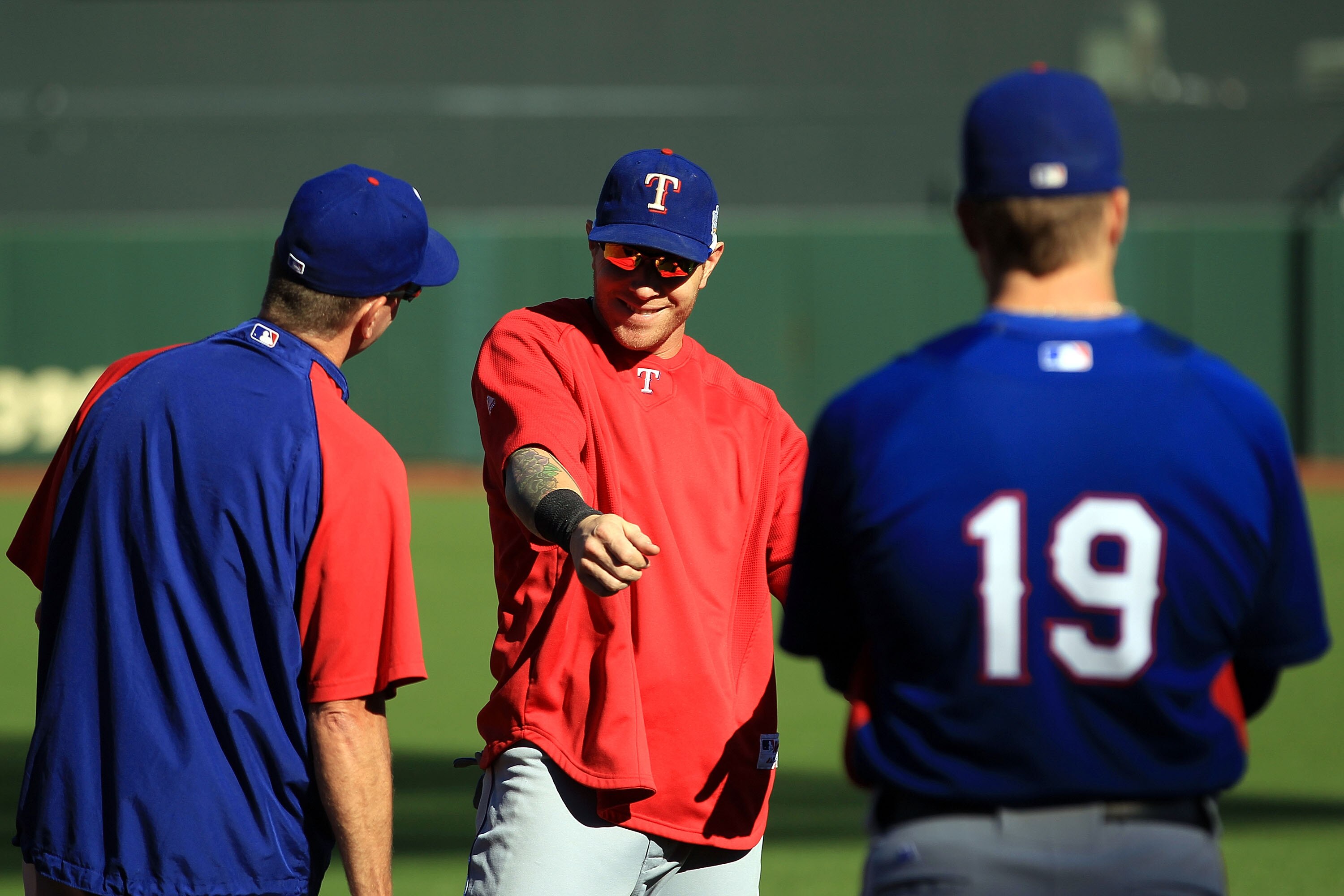 SAN FRANCISCO - OCTOBER 26:  Josh Hamilton #32 of the Texas Rangers talks to his teammates during a workout session at AT&T Park on October 26, 2010 in San Francisco, California. The Texas Rangers will face off against the San Francisco Giants in Game One