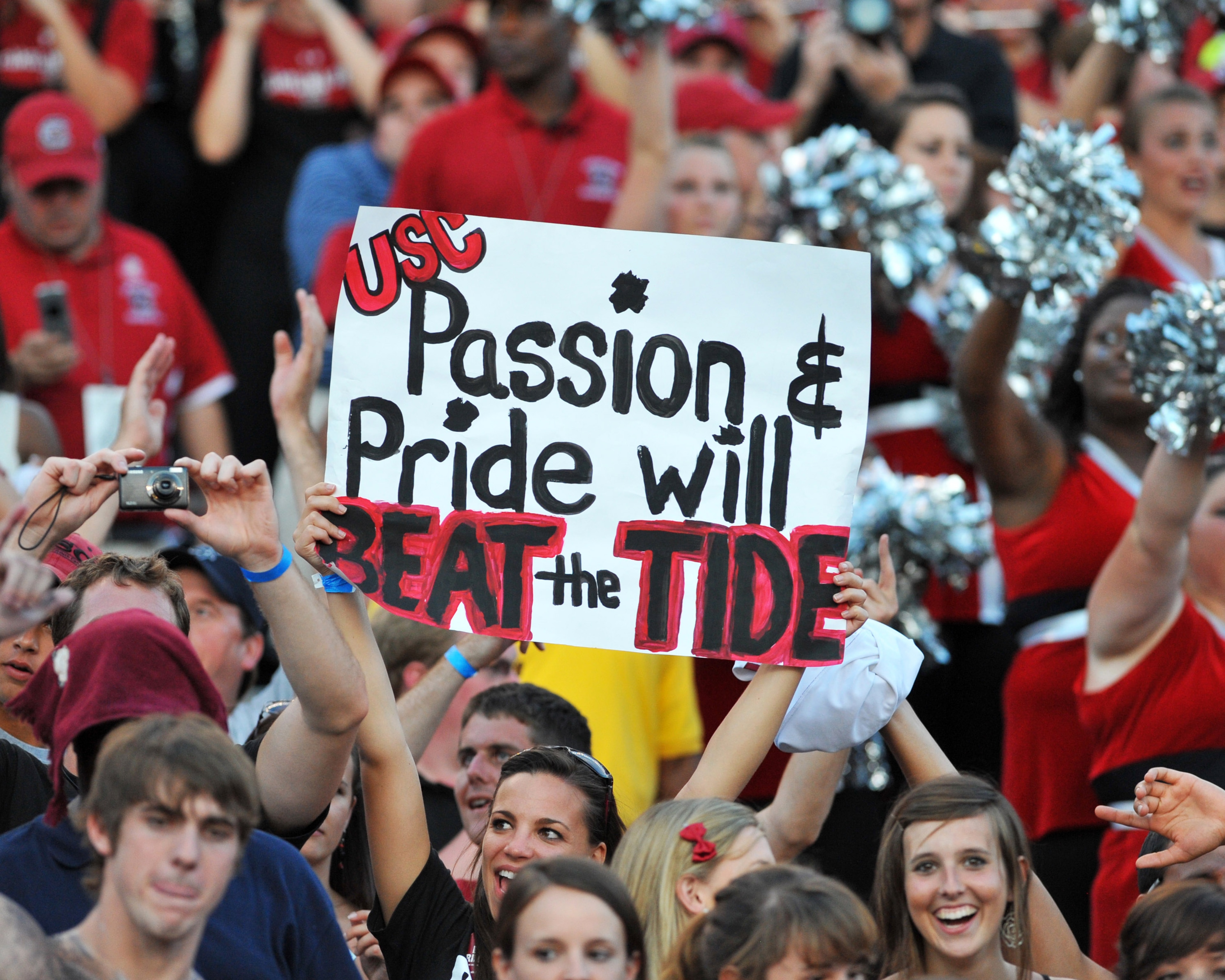 COLUMBIA, SC - OCTOBER 9: Fans of the South Carolina Gamecocks cheer a victory against the Alabama Crimson Tide October 9, 2010 at Williams-Brice Stadium in Columbia, South Carolina.  (Photo by Al Messerschmidt/Getty Images)