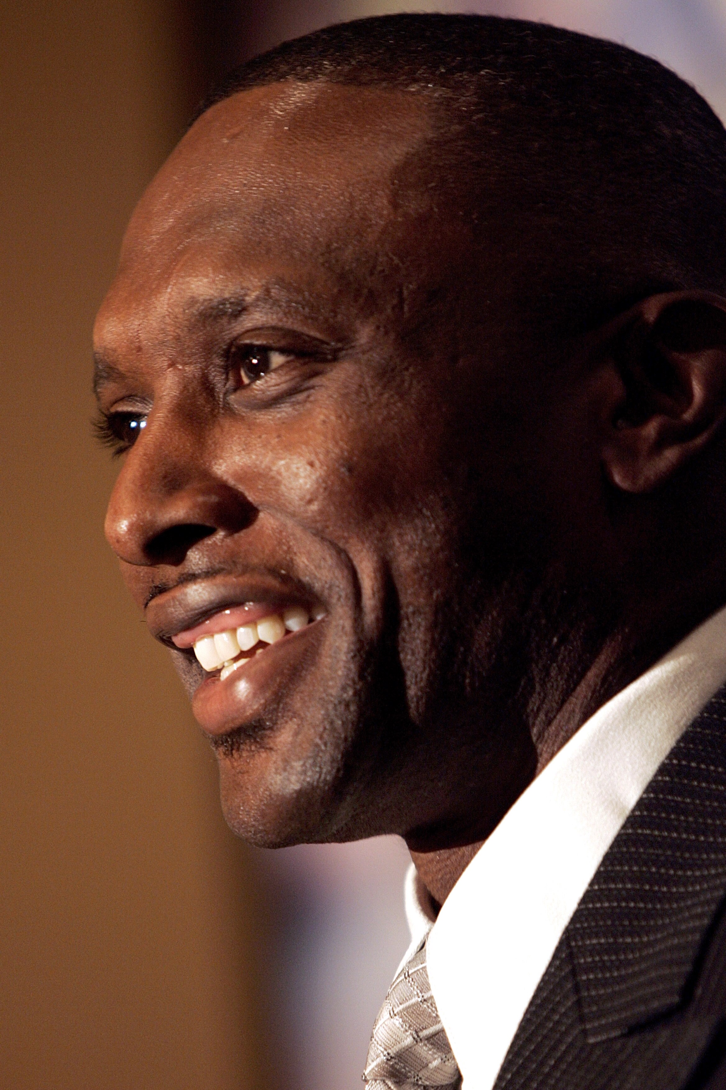 OAKLAND, CA - JULY 18:  Tim Brown announces his retirement from professional football after signing a one day contract with the Oakland Raiders, whom he played most of his career with, during a press conference at the Grand Ballroom of the Oakland Airport