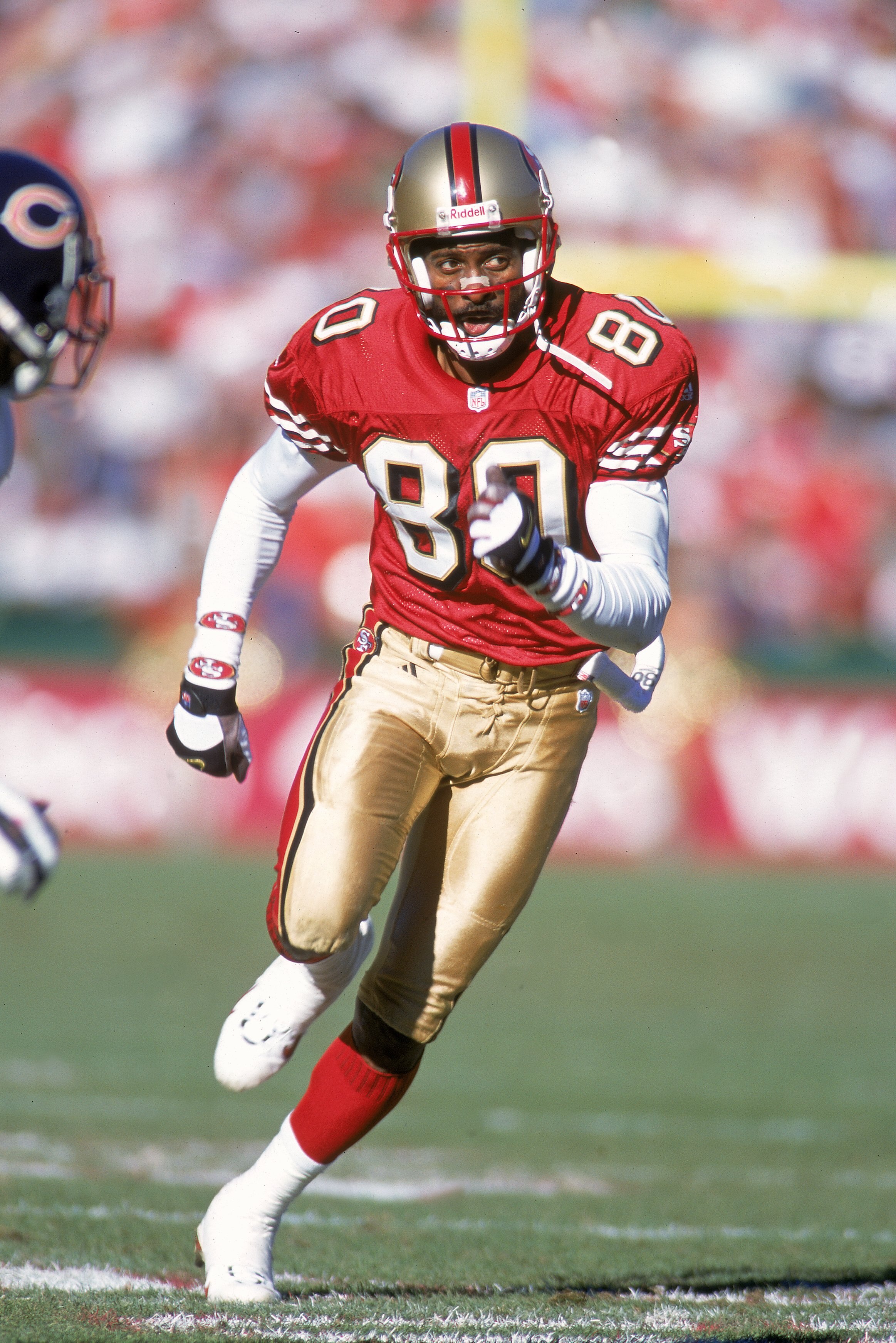 17 Dec 2000:  Jerry Rice #80 of the San Francisco 49ers races during the game against the Chicago Bears at the 3Com Park in San Francisco, California. The 49ers defeated the Bears 17-0.Mandatory Credit: Jed Jacobsohn  /Allsport
