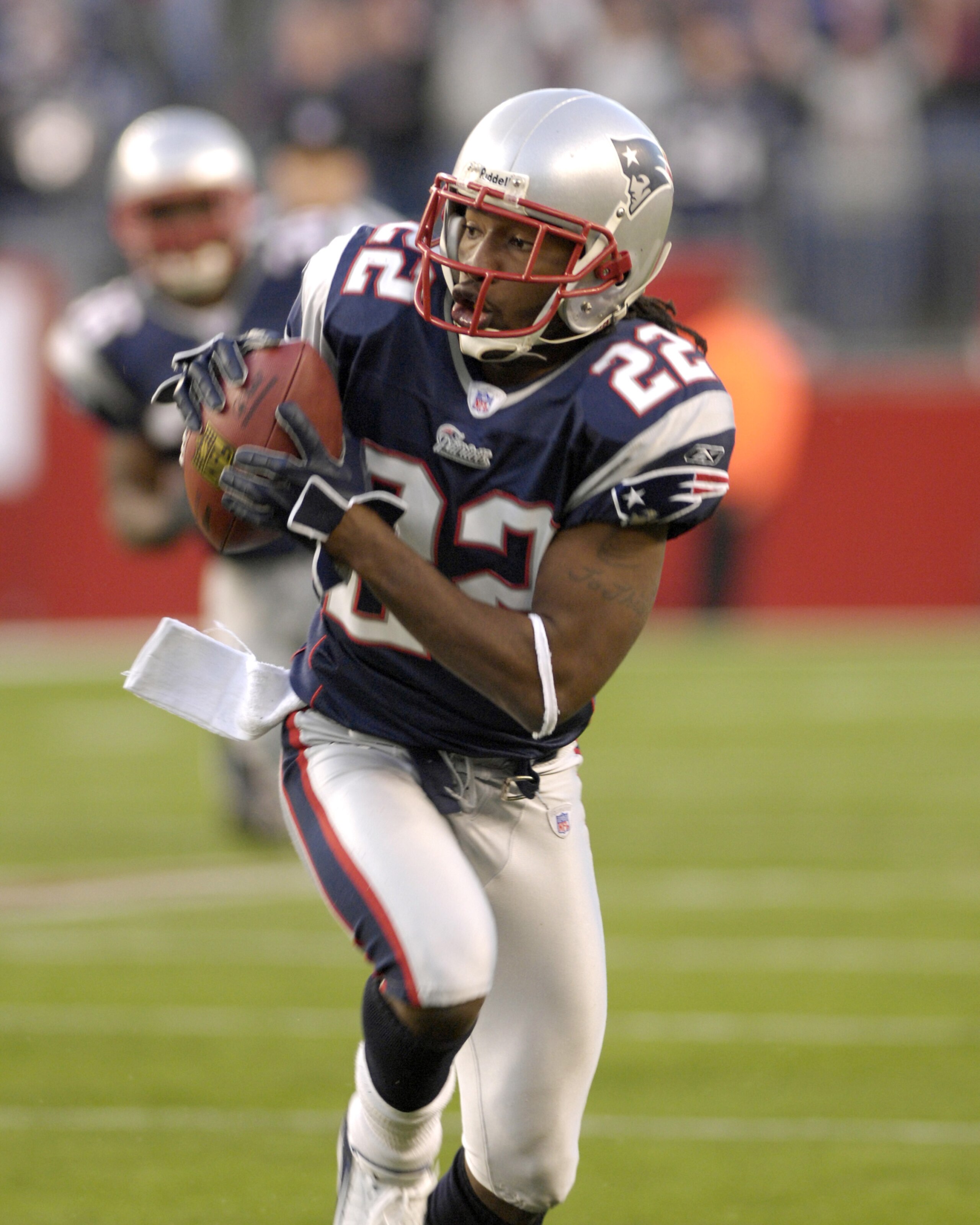 New England Patriots Asante Samuel (22) intercepted a pass and ran the ball in for a touchdown in the fourth quarter against the New York Jets, Sunday, January 7, 2007, at Gillette Stadium in Foxborough, Massachusetts. The Patriots defeated the Jets 37-16