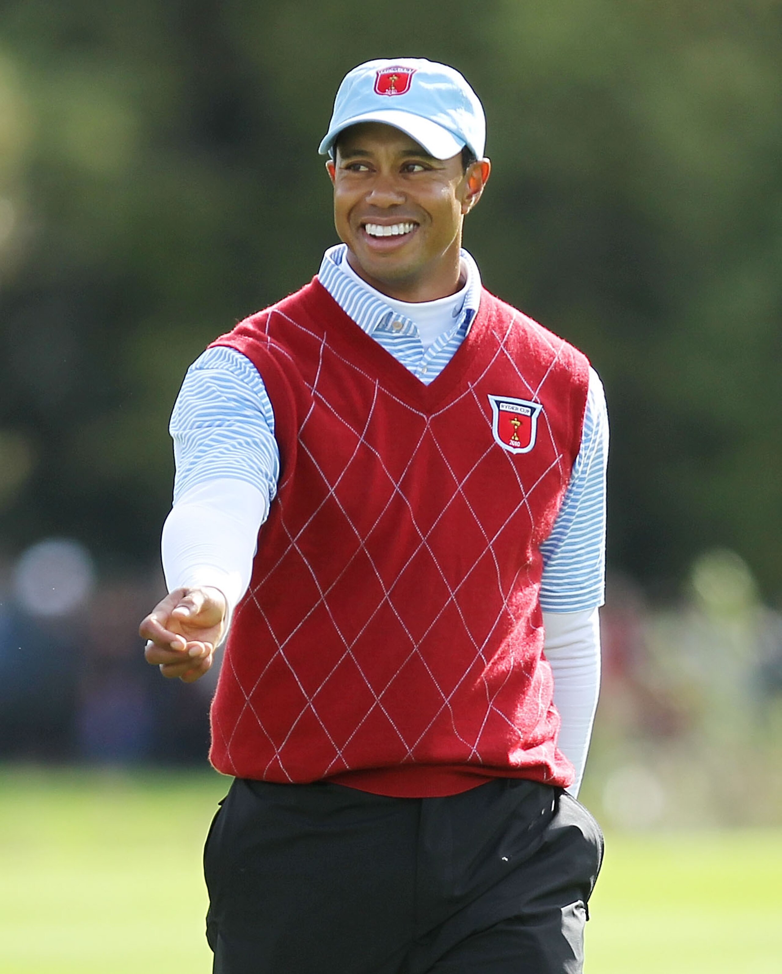 NEWPORT, WALES - OCTOBER 03:  Tiger Woods of the USA smiles during the  Fourball & Foursome Matches during the 2010 Ryder Cup at the Celtic Manor Resort on October 3, 2010 in Newport, Wales. (Photo by Andy Lyons/Getty Images)