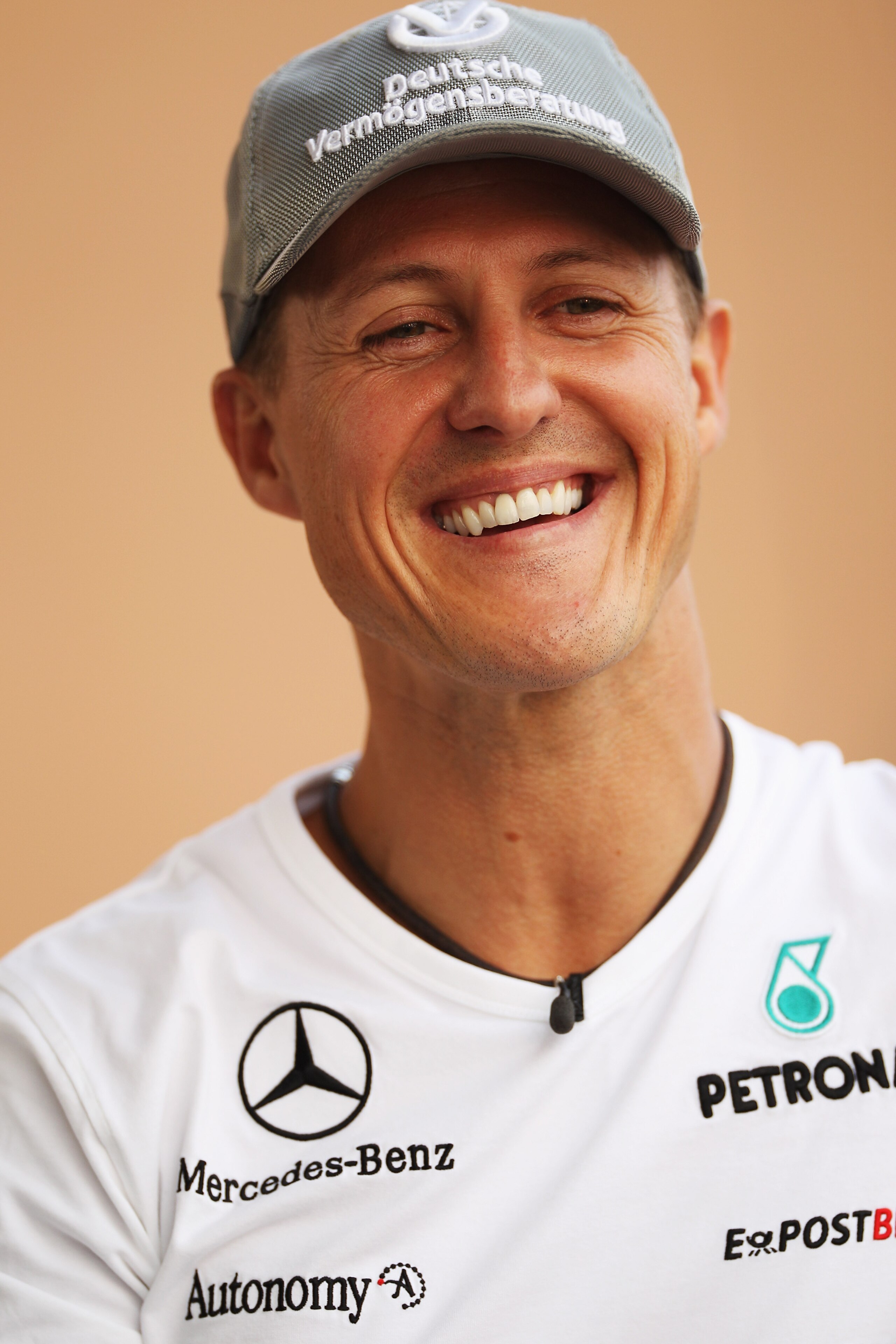 YEONGAM-GUN, SOUTH KOREA - OCTOBER 21: Michael Schumacher of Germany and Mercedes GP is interviewed in the paddock during previews to the Korean Formula One Grand Prix at the Korea International Circuit on October 21, 2010 in Yeongam-gun, South Korea.  (P