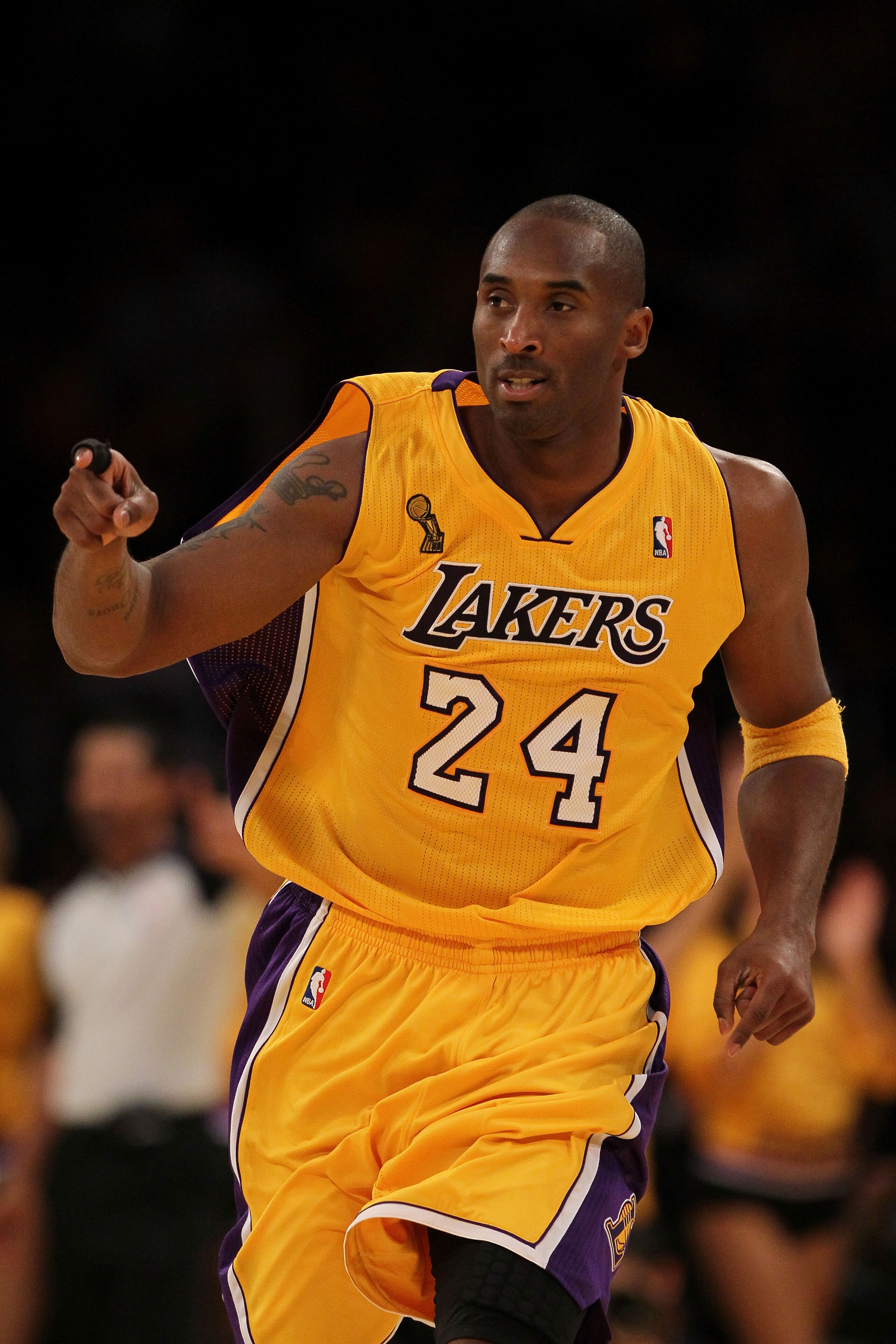 LOS ANGELES, CA - OCTOBER 26:  Kobe Bryant #24 of the Los Angeles Lakers reacts to a play against the Houston Rockets during their opening night game at Staples Center on October 26, 2010 in Los Angeles, California. NOTE TO USER: User expressly acknowledg
