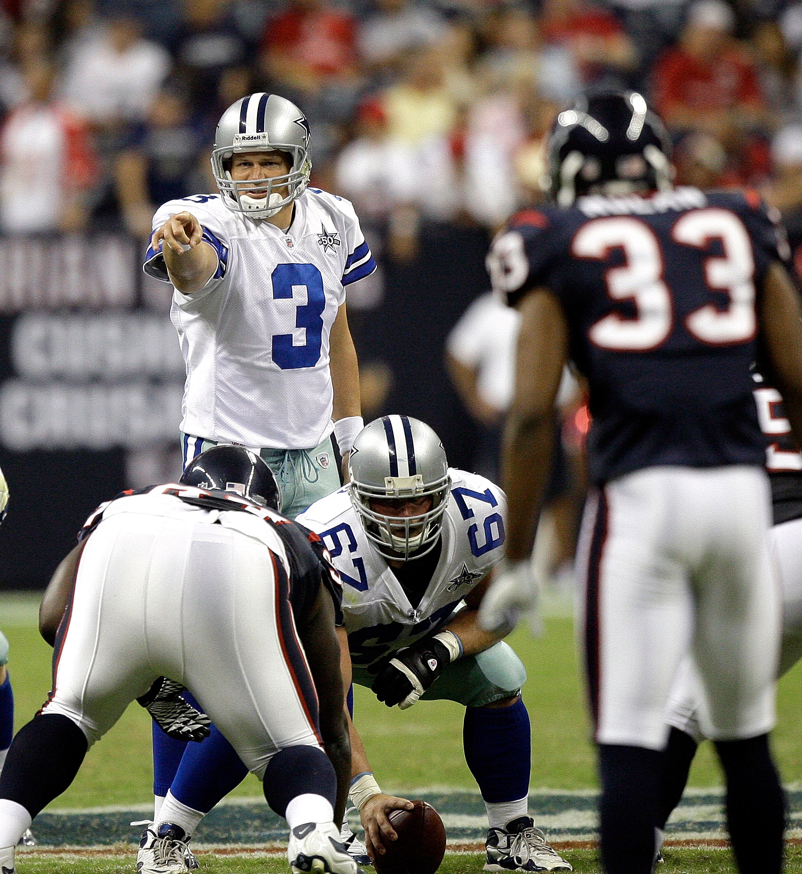 HOUSTON - AUGUST 28: Quarterback Jon Kitna #3 of the Dallas Cowboys makes an adjustment on the play during a football game against the Houston Texans as he waits for center Phil Costa #67 to hike the ball at Reliant Stadium on August 28, 2010 in Houston,