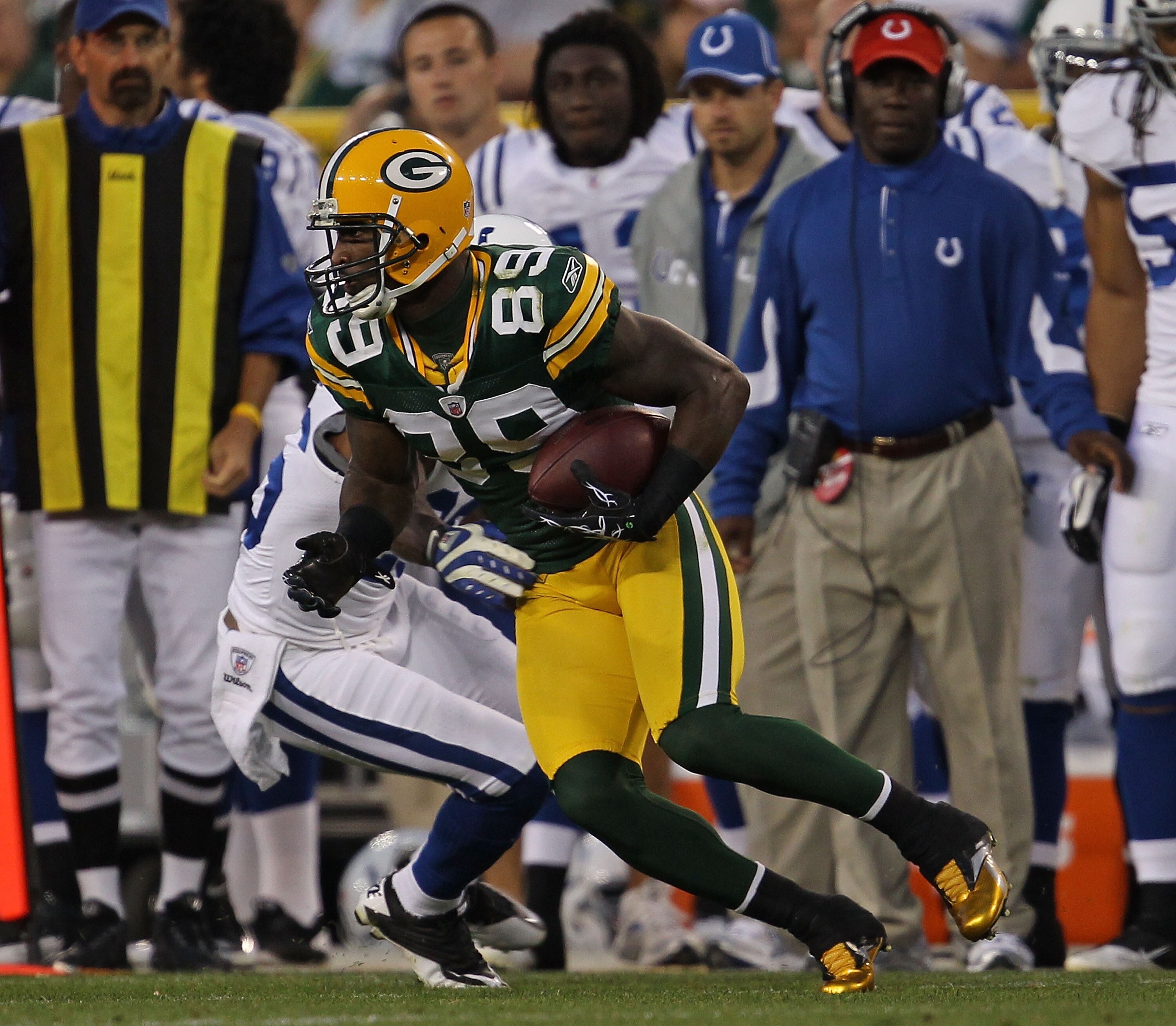 GREEN BAY, WI - AUGUST 26: James Jones #89 of the Green Bay Packers moves around Kelvin Hayden #26 of the Indianapolis Colts during a preseason game at Lambeau Field on August 26, 2010 in Green Bay, Wisconsin. The Packers defeated the Colts 59-24. (Photo 