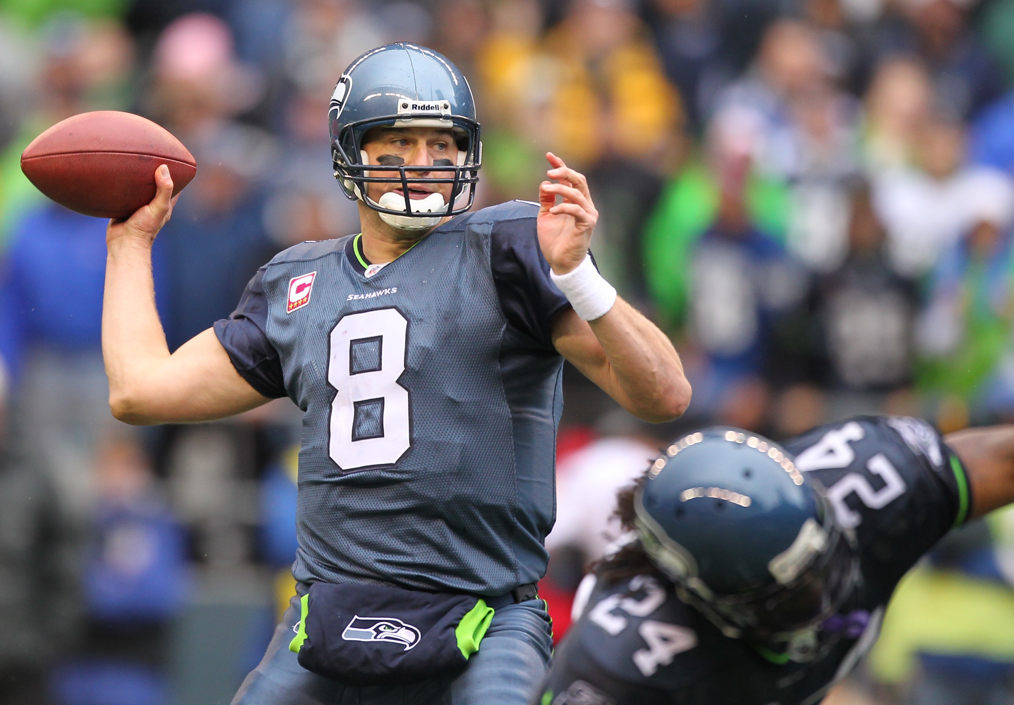 SEATTLE - OCTOBER 24:  Quarterback Matt Hasselbeck #8 of the Seattle Seahawks passes against the Arizona Cardinals at Qwest Field on October 24, 2010 in Seattle, Washington. (Photo by Otto Greule Jr/Getty Images)