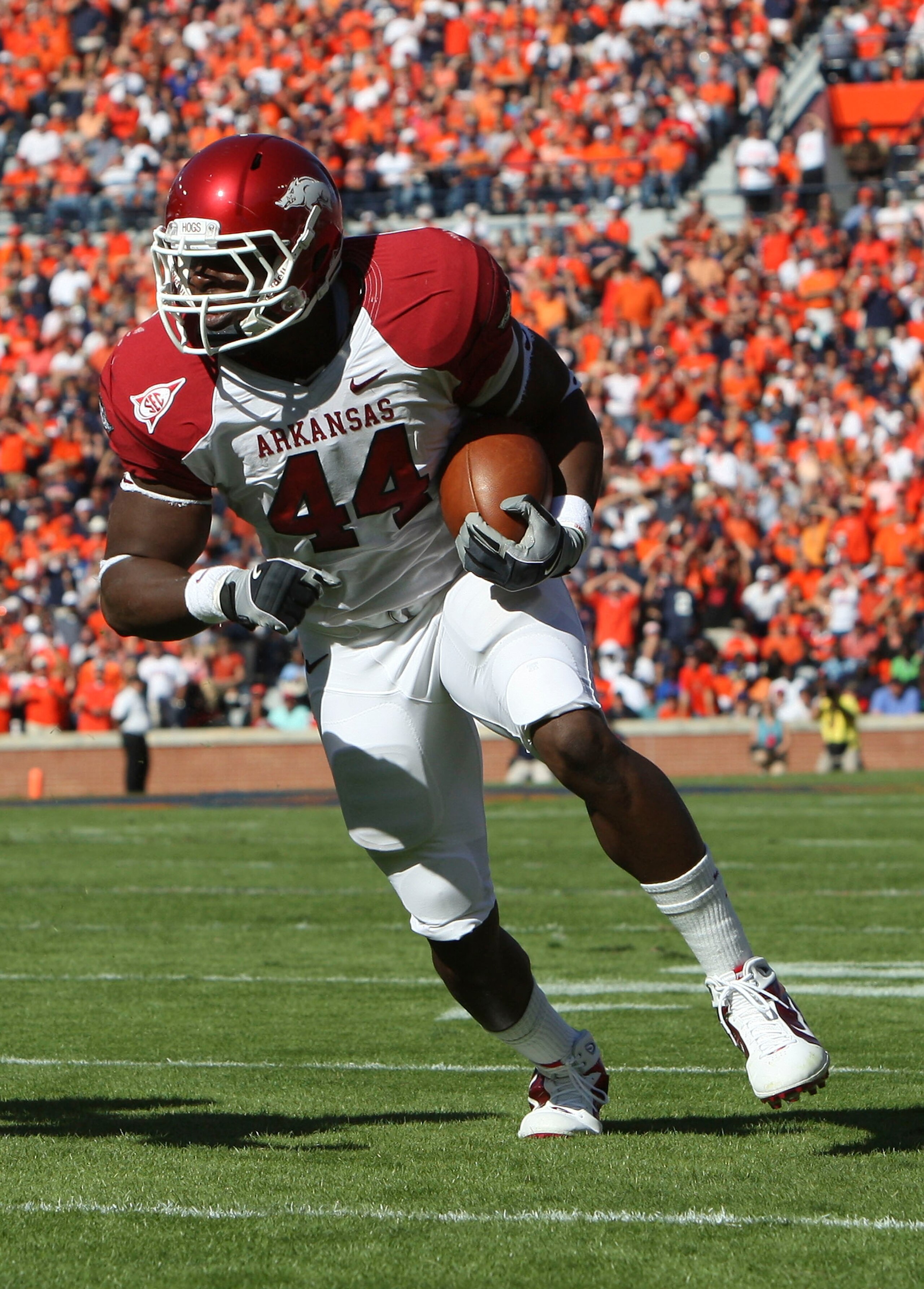 AUBURN, AL - OCTOBER 16:  Fullback Van Stumon #44 of the Arkansas Razorbacks runs with the ball during the game against the Auburn Tigers at Jordan-Hare Stadium on October 16, 2010 in Auburn, Alabama.  (Photo by Mike Zarrilli/Getty Images)