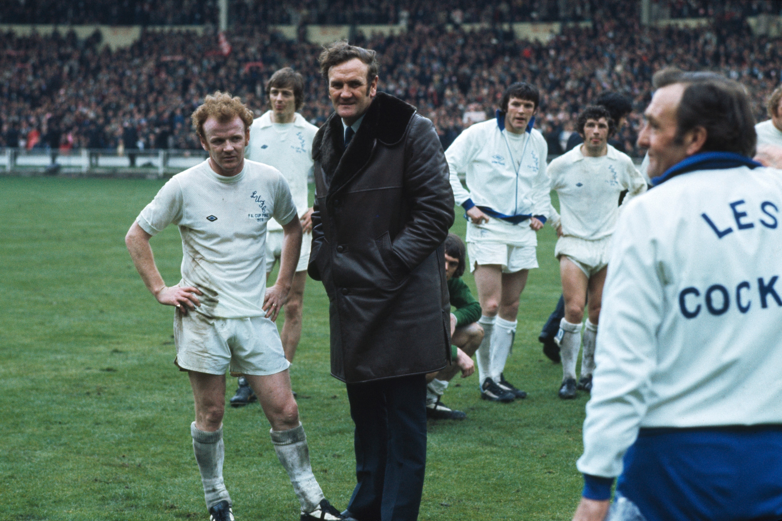 1973: Billy Bremner (left) and Leeds Manager Don Revie (right) chat before the FA Cup final against Sunderland at Wembley Stadium in London. Sunderland won the match 1-0. (Photo by Getty Images)