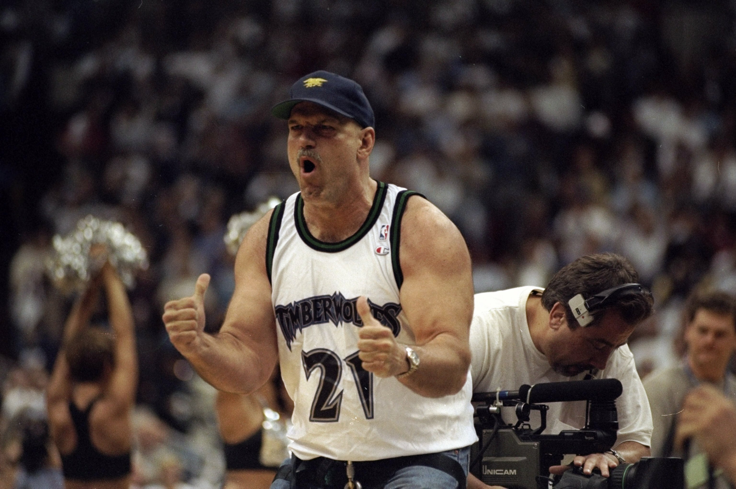 28 Apr 1998: Former Pro wrestler Jesse The Body Ventura cheers for the Minneapolis Timberwolves during a game against the Seattle Super Sonics at the Target Center in Minneapolis, Minnesota. The Timberwolves defeated the Sonics 98-90.