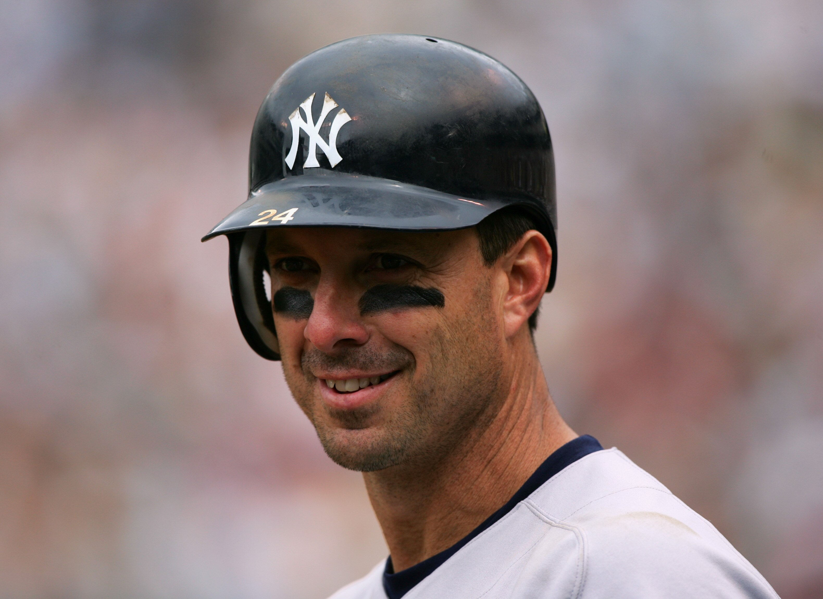 OAKLAND, CA - MAY 15:  Infielder Tino Martinez #24 of the New York Yankees smiles during the game against the Oakland Athletics at McAfee Coliseum on May 15, 2005 in Oakland, California.  The Yankees won 6-4.  (Photo by Jed Jacobsohn/Getty Images)