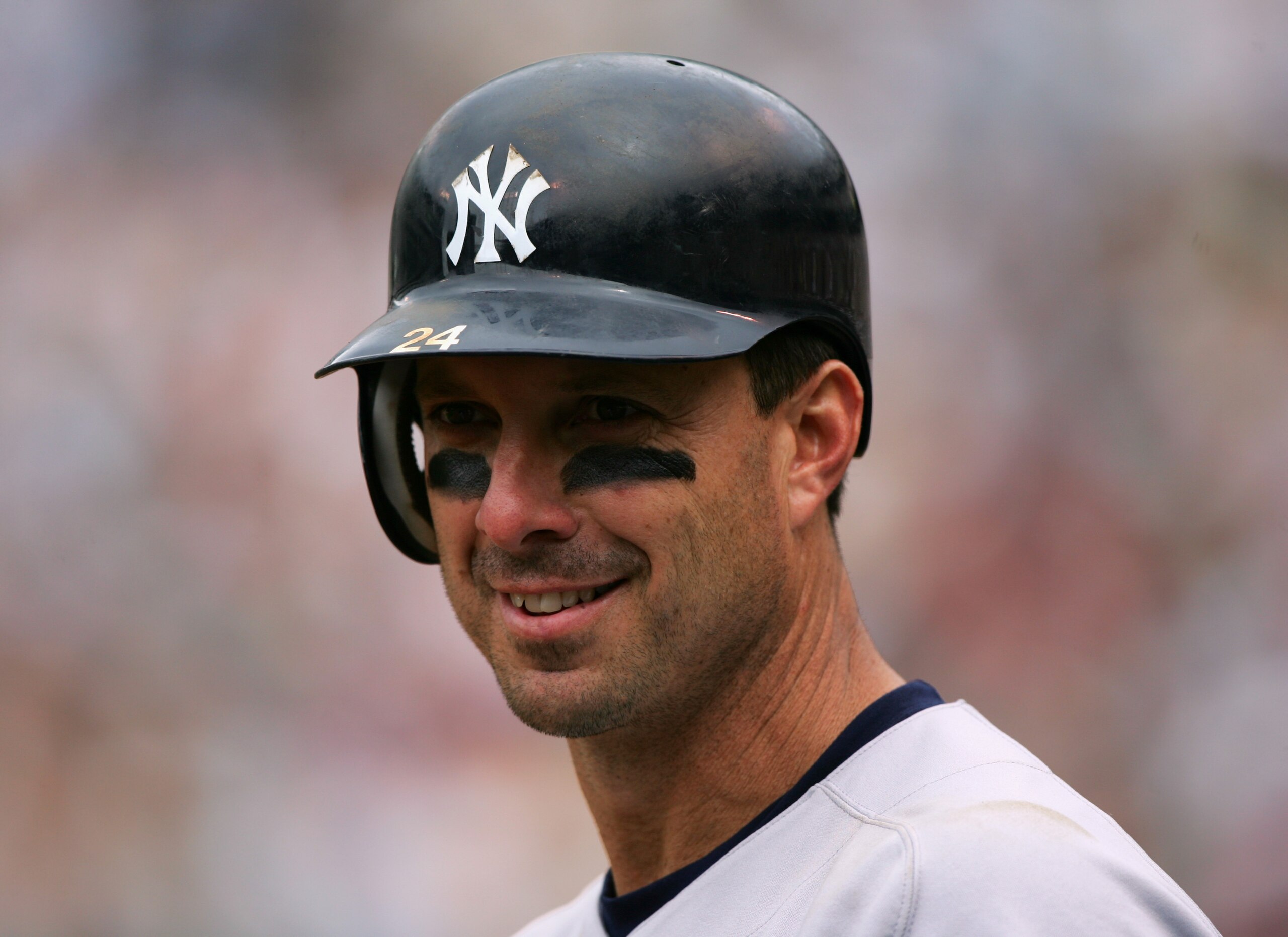 OAKLAND, CA - MAY 15:  Infielder Tino Martinez #24 of the New York Yankees smiles during the game against the Oakland Athletics at McAfee Coliseum on May 15, 2005 in Oakland, California.  The Yankees won 6-4.  (Photo by Jed Jacobsohn/Getty Images)