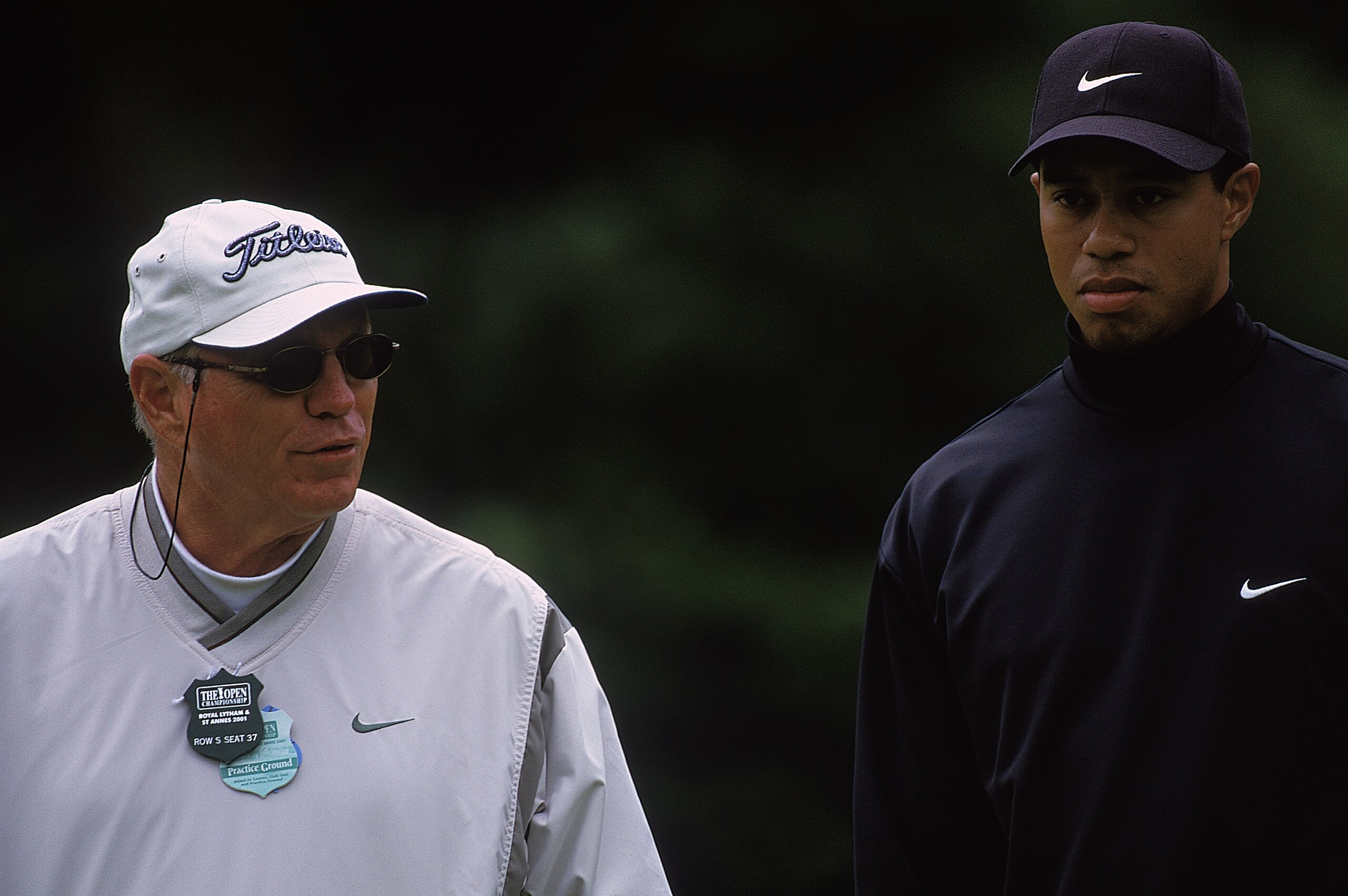 18 Jul 2001: Tiger Woods of the USA stands with his Coach Butch Harmon during the British Open Championships at the Royal Lytham St. Annes Golf Course in Lancashire, England.Mandatory Credit: Harry How /Allsport 18 Jul 2001: Tiger Woods of the USA stands with his Coach Butch Harmon during the British Open Championships at the Royal Lytham St. Annes Golf Course in Lancashire, England.Mandatory Credit: Harry How /Allsport