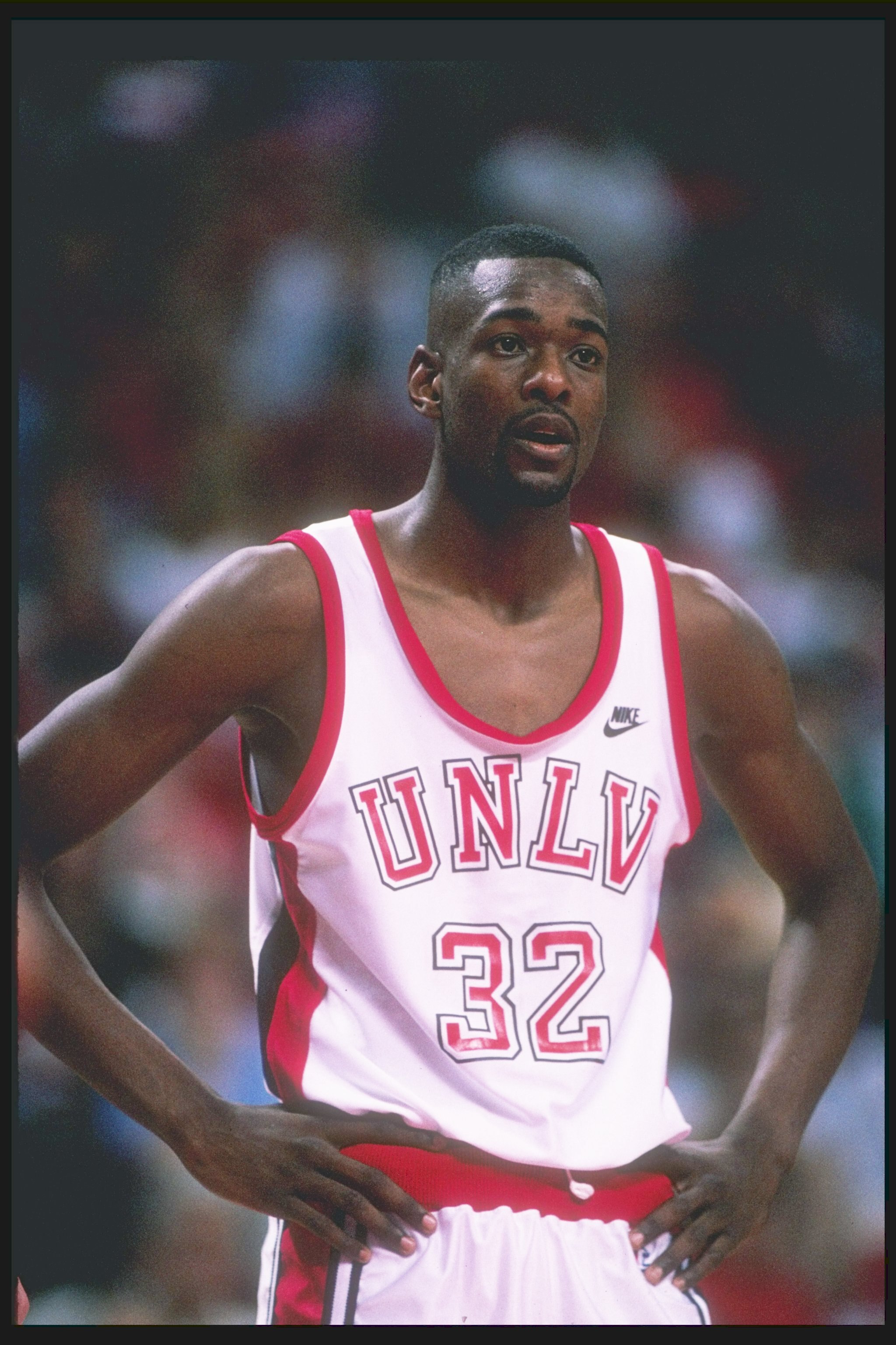 LAS VEGAS - 1989-1990:  Guard Stacey Augmon #32 of the UNLV Running Rebels looks on during a game in the 1989-90 season at the Thomas & Mack Center in Las Vegas, Nevada. (Photo by: Stephen Dunn/Getty Images)
