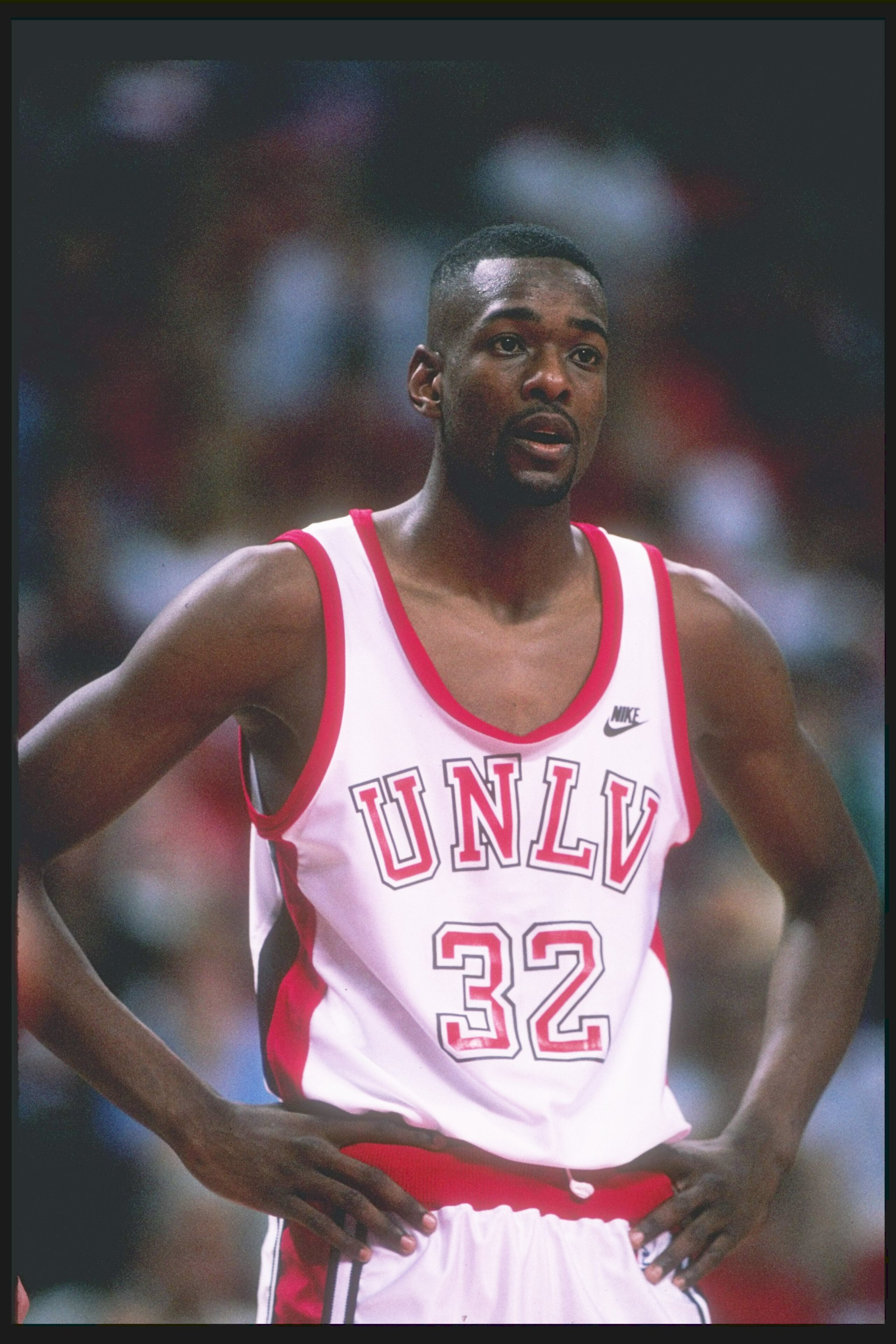 LAS VEGAS - 1989-1990:  Guard Stacey Augmon #32 of the UNLV Running Rebels looks on during a game in the 1989-90 season at the Thomas & Mack Center in Las Vegas, Nevada. (Photo by: Stephen Dunn/Getty Images)