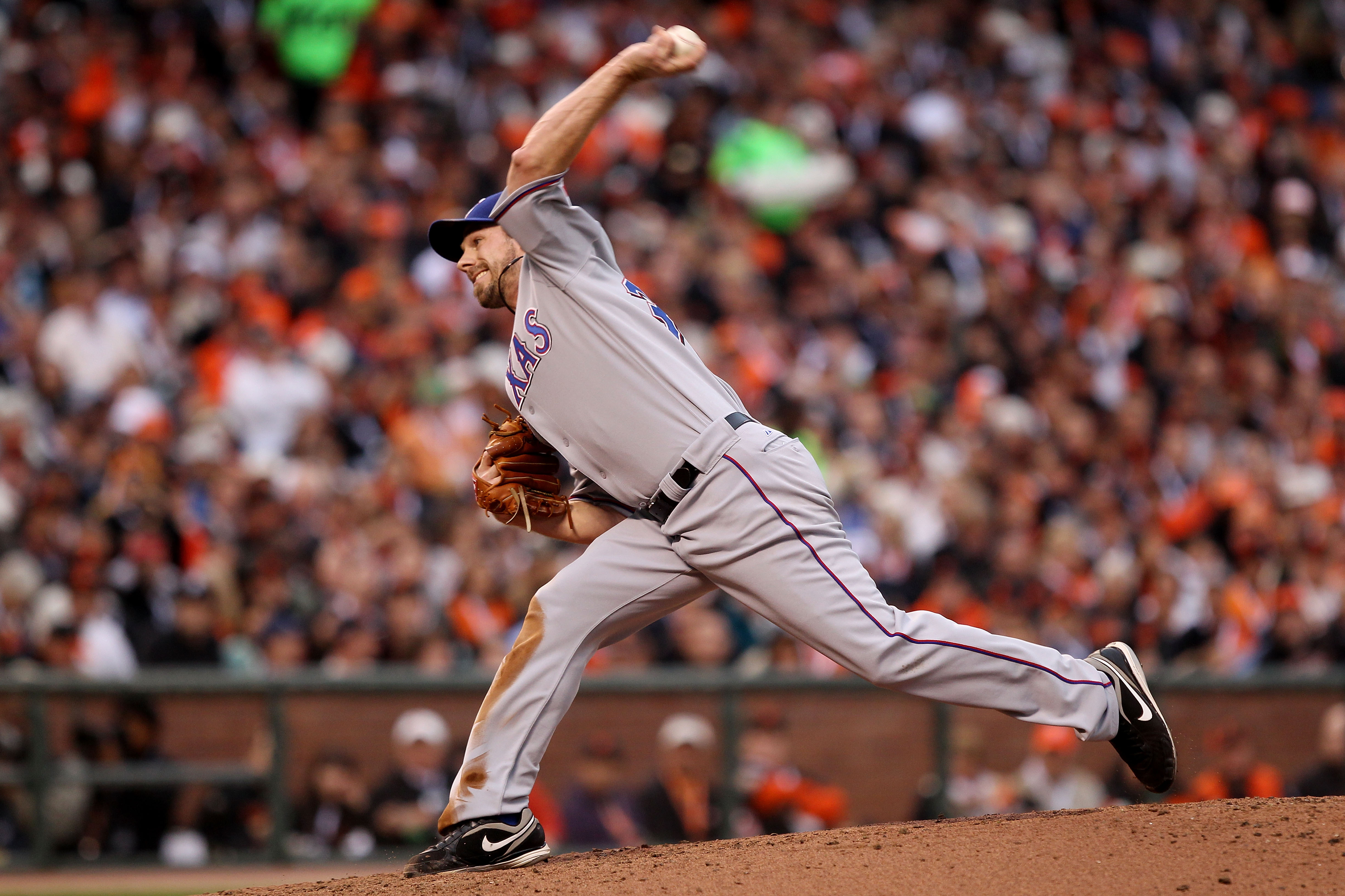 SAN FRANCISCO - OCTOBER 27: Cliff Lee #33 of the Texas Rangers pitches against the San Francisco Giants in Game One of the 2010 MLB World Series at AT&T Park on October 27, 2010 in San Francisco, California. (Photo by Jed Jacobsohn/Getty Images) SAN FRANCISCO - OCTOBER 27: Cliff Lee #33 of the Texas Rangers pitches against the San Francisco Giants in Game One of the 2010 MLB World Series at AT&T Park on October 27, 2010 in San Francisco, California. (Photo by Jed Jacobsohn/Getty Images)