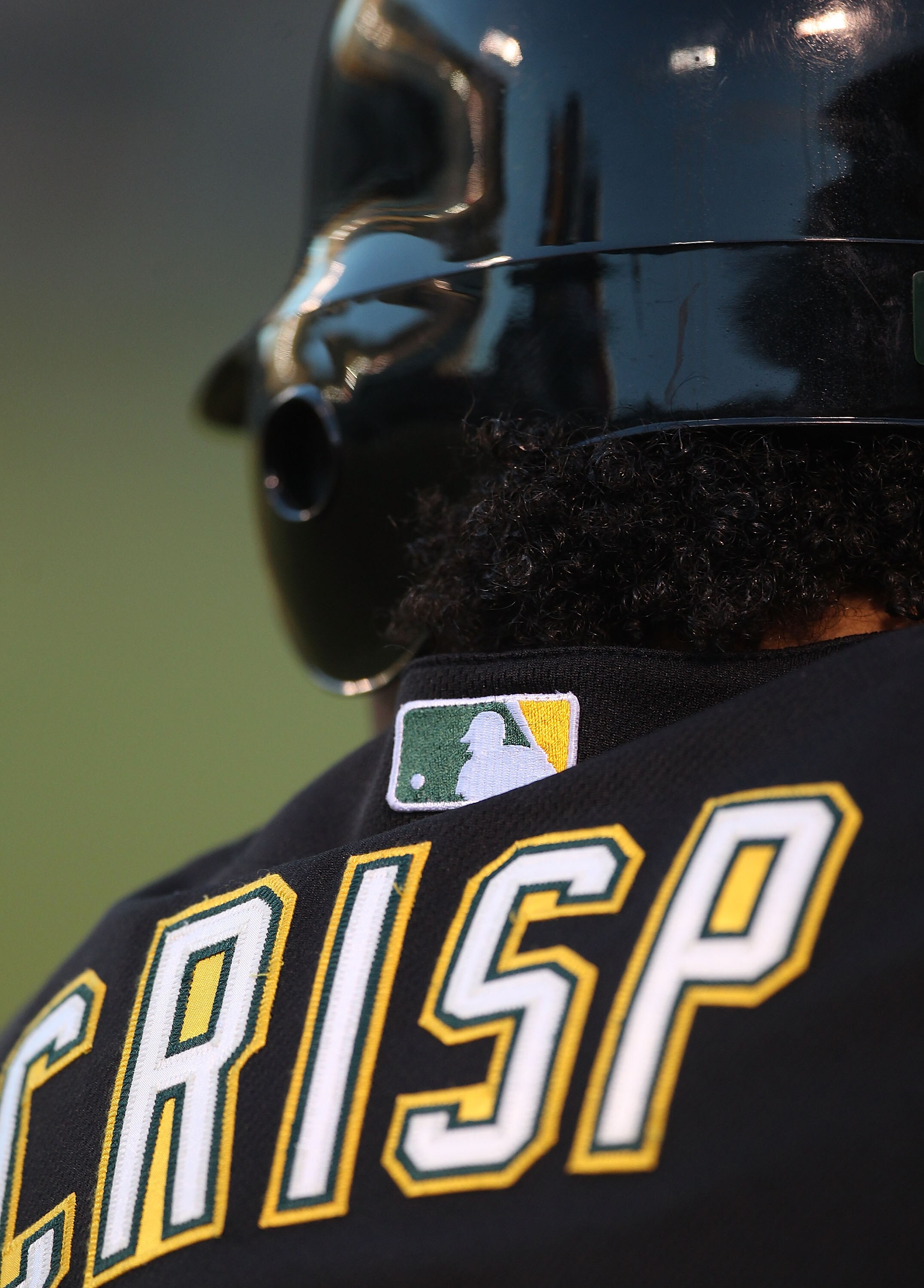 OAKLAND, CA - SEPTEMBER 03:  Coco Crisp #4 of the Oakland Athletics waits to bat against the Los Angeles Angels of Anaheim during a Major League Baseball game at the Oakland-Alameda County Coliseum on September 3, 2010 in Oakland, California.  (Photo by J