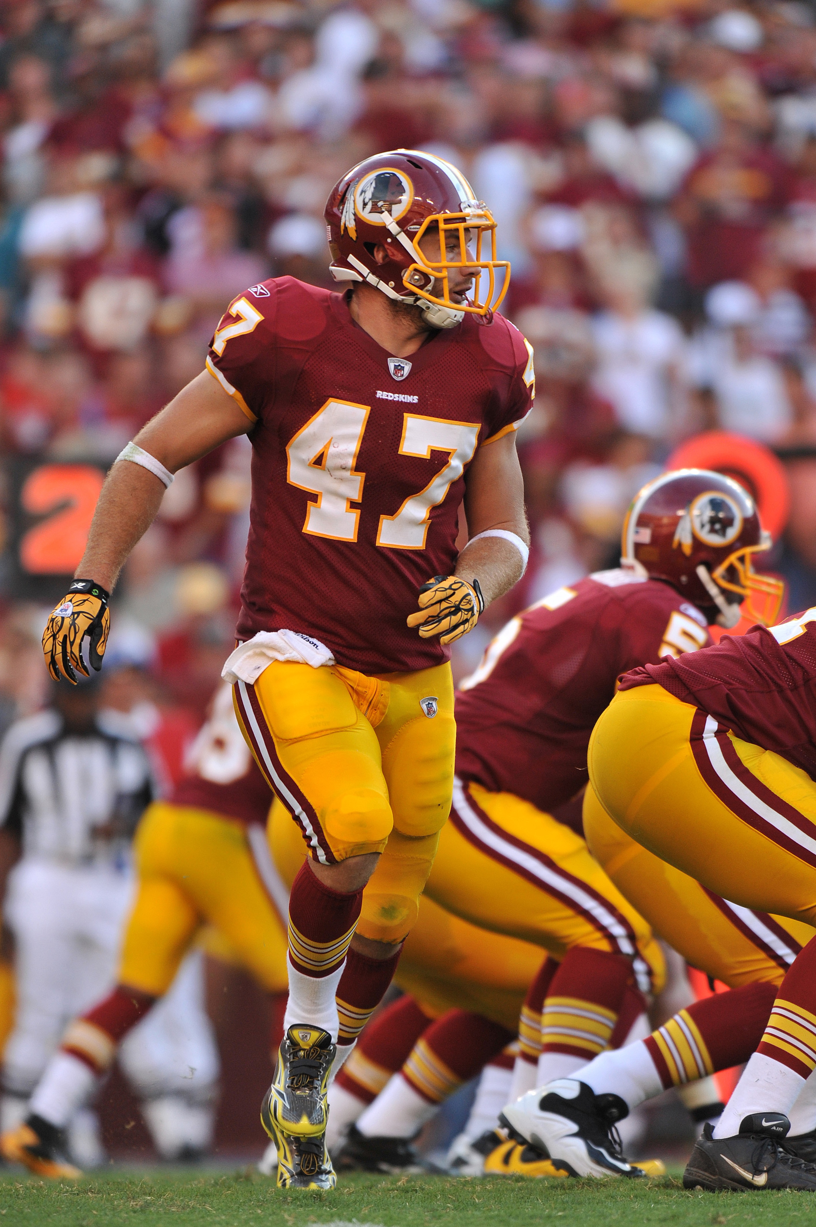 LANDOVER - SEPTEMBER 19:  Chris Cooley #47 of the Washington Redskins runs in the backfield during the game against the Houston Texans at FedExField on September 19, 2010 in Landover, Maryland. The Texans defeated the Redskins in overtime 30-27. (Photo by