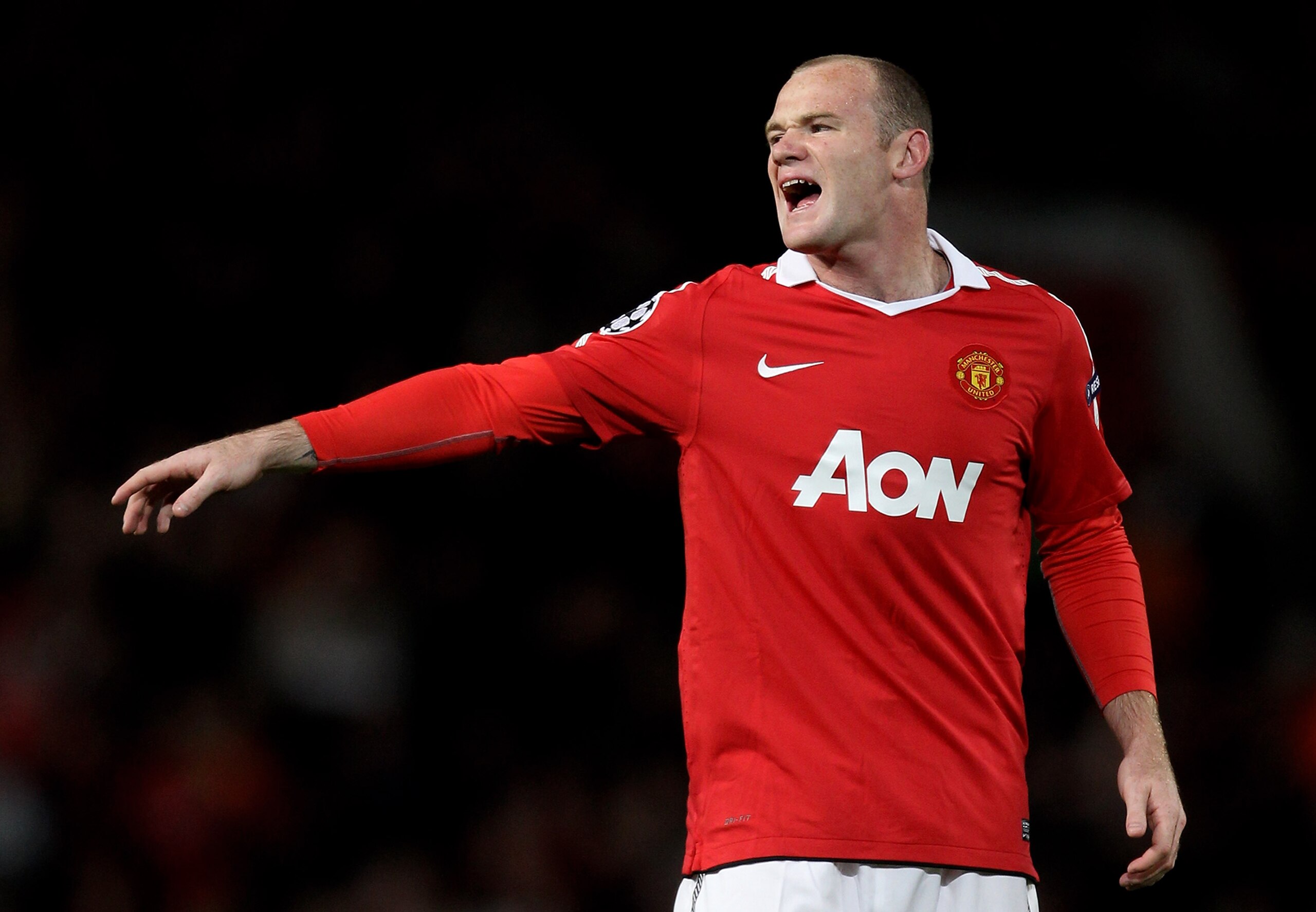 MANCHESTER, ENGLAND - SEPTEMBER 14:  Wayne Rooney of Manchester United shouts during the UEFA Champions League Group C match between Manchester United and Rangers at Old Trafford on September 14, 2010 in Manchester, England.  (Photo by Alex Livesey/Getty