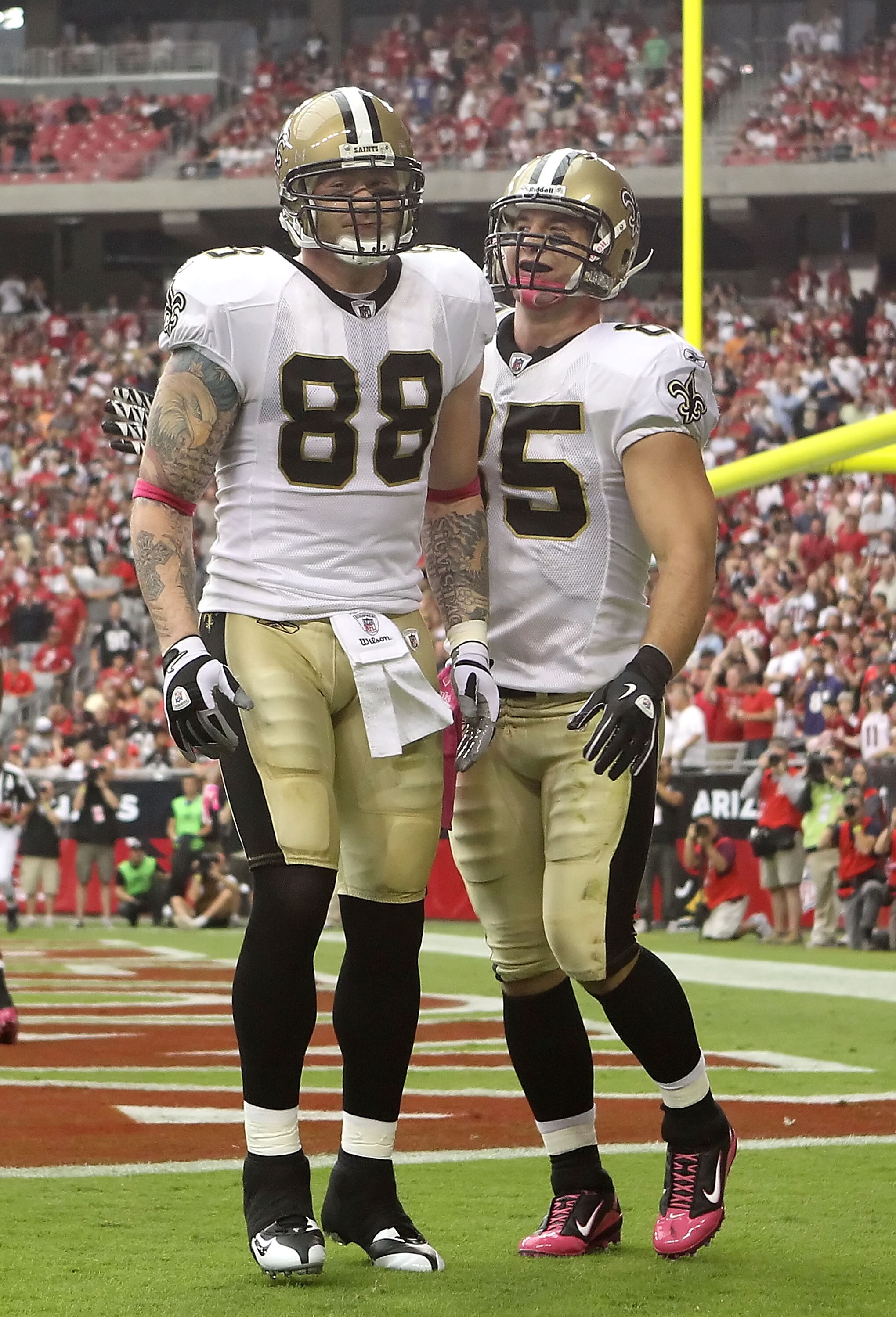 GLENDALE, AZ - OCTOBER 10:  Tight end Jeremy Shockey #88 of the New Orleans Saints celebrates with teammate David Thomas #85 after Shockey caught a 1 yard touchdown reception against the Arizona Cardinals during the first quarter of the NFL game at the Un