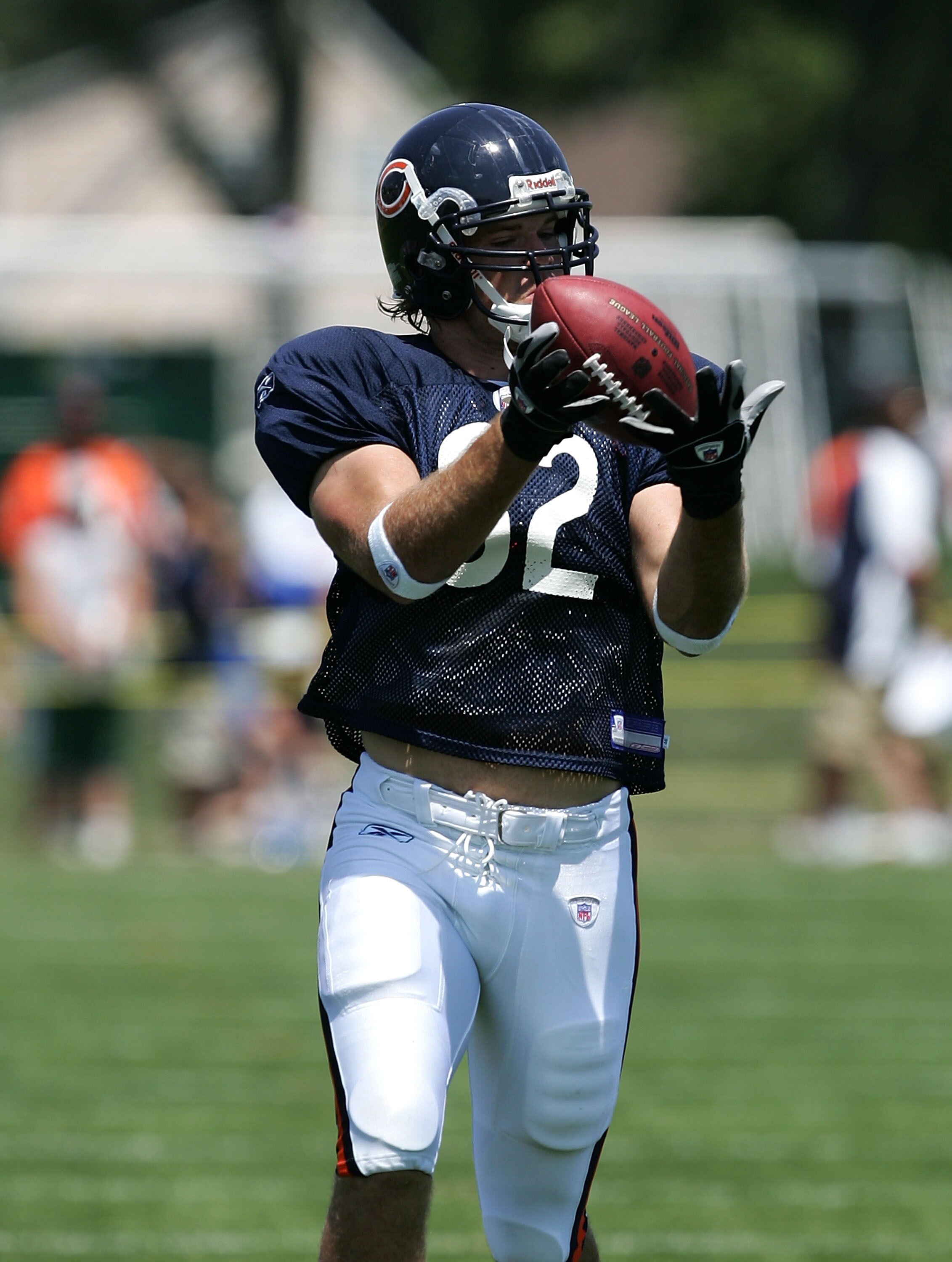 BOURBONNAIS, IL - JULY 30: Greg Olsen #82 of the Chicago Bears, the Bears' first round draft pick, ctahces a pass during a summer training camp practice on July 30, 2007 at Olivet Nazarene University in Bourbonnais, Illinois. (Photo by Jonathan Daniel/Get