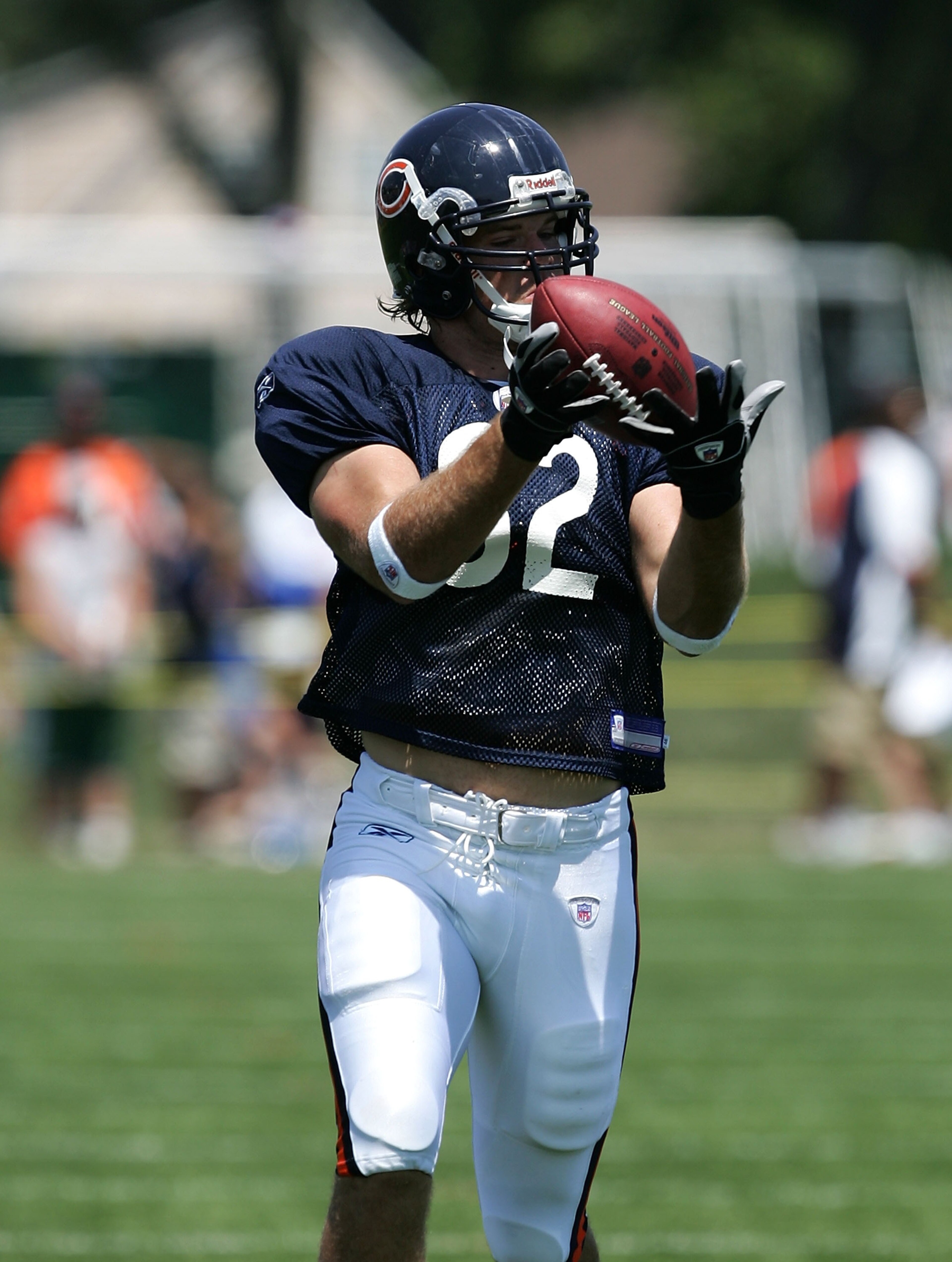 BOURBONNAIS, IL - JULY 30: Greg Olsen #82 of the Chicago Bears, the Bears' first round draft pick, ctahces a pass during a summer training camp practice on July 30, 2007 at Olivet Nazarene University in Bourbonnais, Illinois. (Photo by Jonathan Daniel/Get