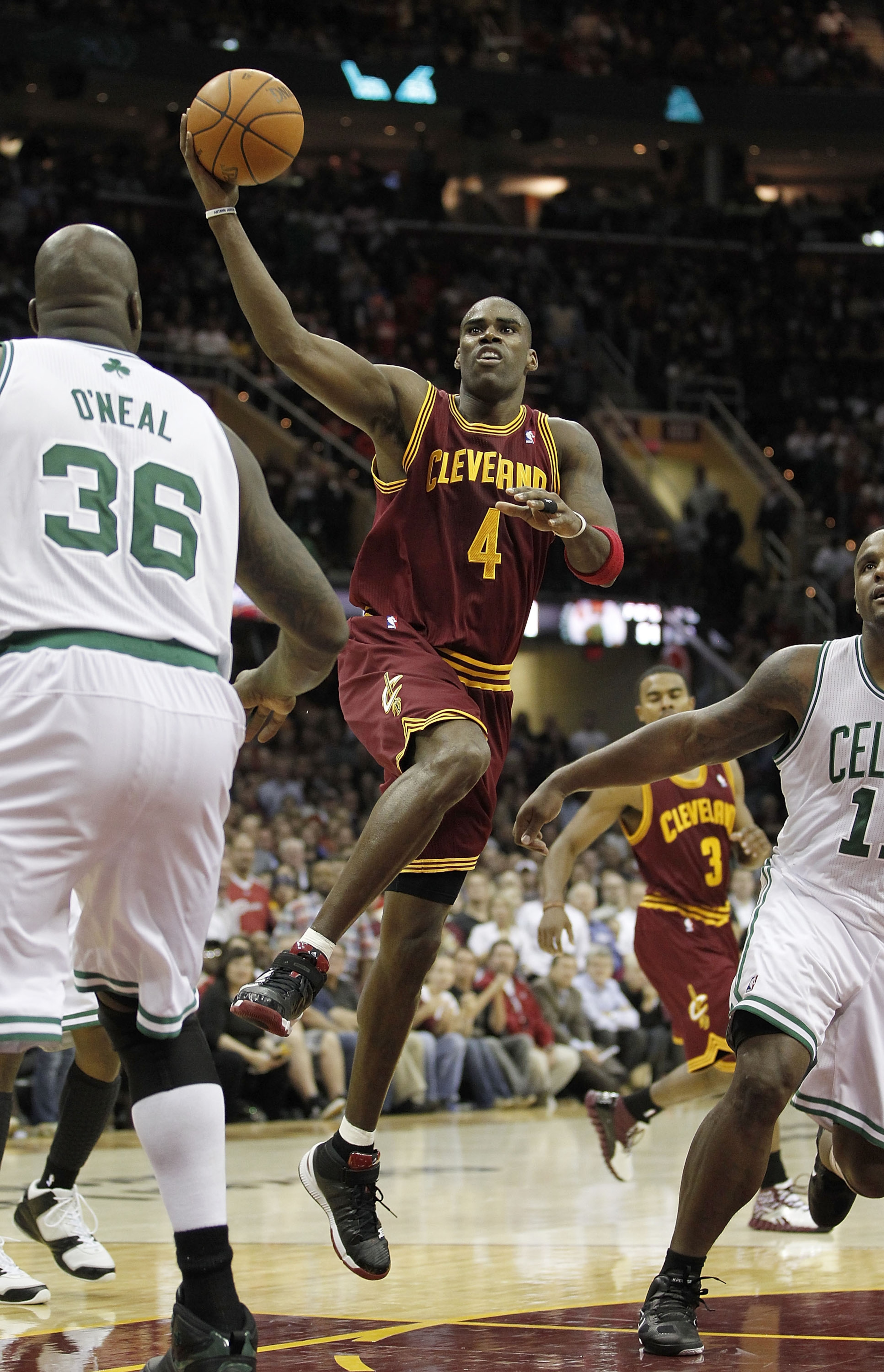 CLEVELAND - OCTOBER 27:  Antawn Jamison #4 of the Cleveland Cavaliers tries to get a shot off over Shaquille O'Neal #36 of the Boston Celtics at Quicken Loans Arena on October 27, 2010 in Cleveland, Ohio. Cleveland won the game 95-87.  (Photo by Gregory S