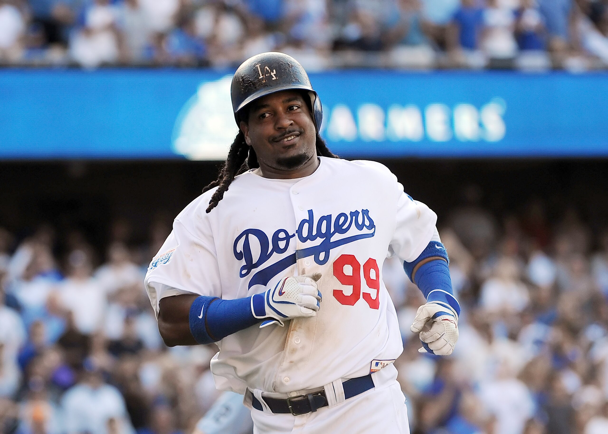 LOS ANGELES - JUNE 26:  Manny Ramirez #99 of the Los Angeles Dodgers scores in the fourth inning against the New York Yankees on June 26, 2010 at Dodger Stadium in Los Angeles, California.  (Photo by Lisa Blumenfeld/Getty Images)