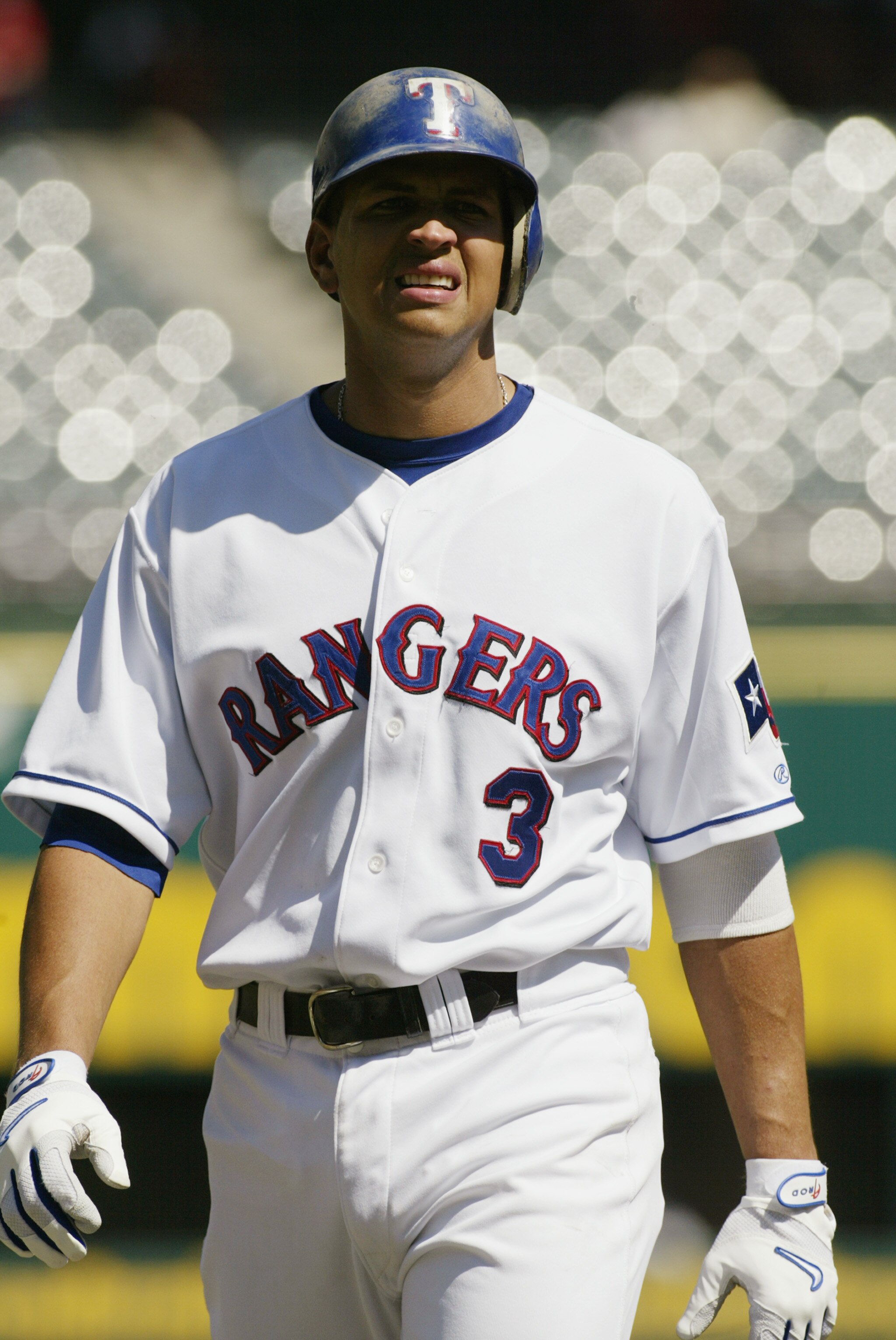 ARLINGTON, TX - SEPTEMBER 26:  Short stop Alex Rodriguez #3 of the Texas Rangers looks on against the Anaheim Angels on September 26, 2002 at the Ballpark in Arlington, TX.  The Angels won 10-5.  (Photo by Ronald Martinez/Getty Images)