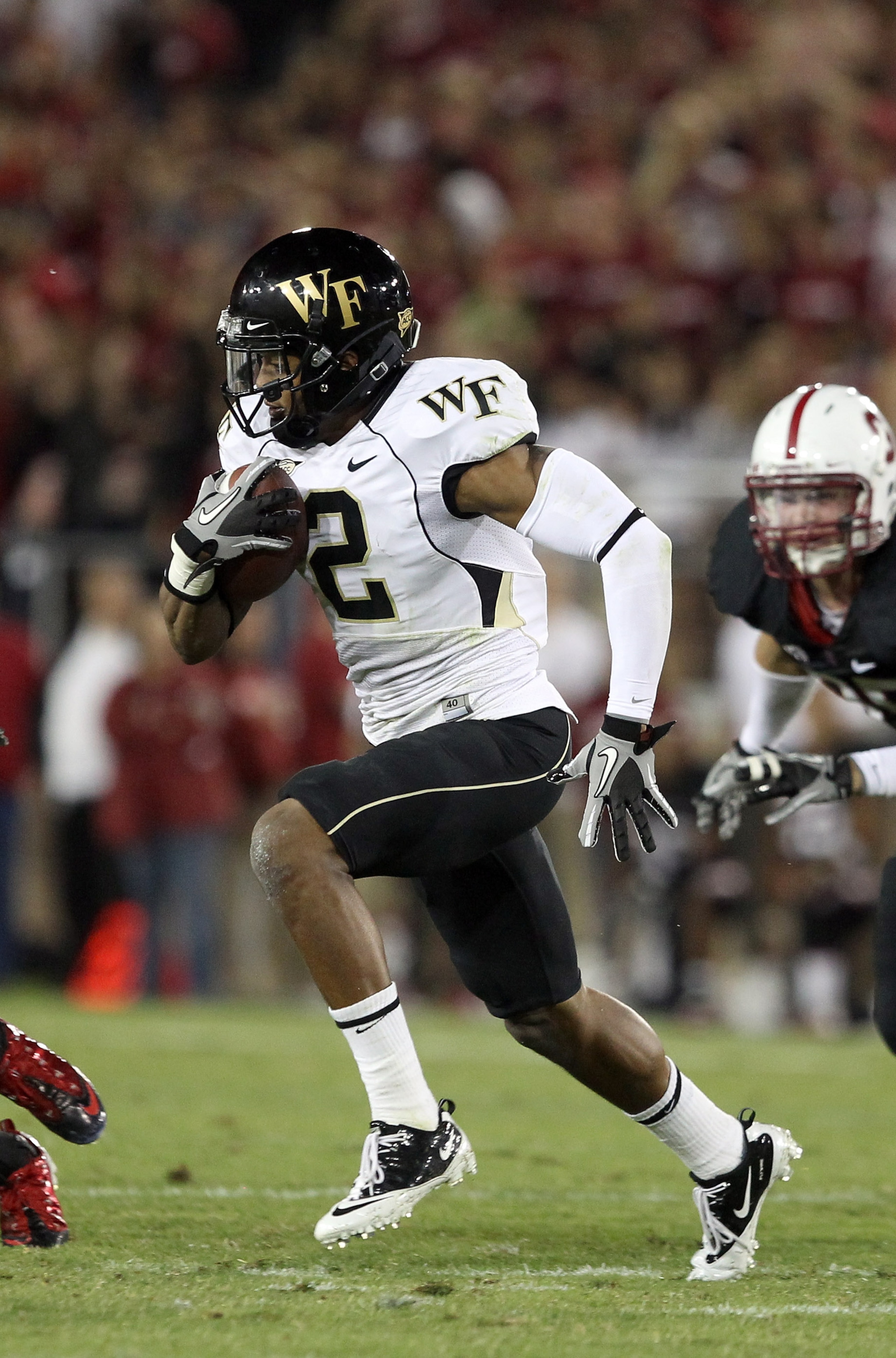 PALO ALTO, CA - SEPTEMBER 18: Chris Givens #2 of the Wake Forest Demon Deacons in action against the Stanford Cardinal at Stanford Stadium on September 18, 2010 in Palo Alto, California. (Photo by Ezra Shaw/Getty Images) PALO ALTO, CA - SEPTEMBER 18: Chris Givens #2 of the Wake Forest Demon Deacons in action against the Stanford Cardinal at Stanford Stadium on September 18, 2010 in Palo Alto, California. (Photo by Ezra Shaw/Getty Images)