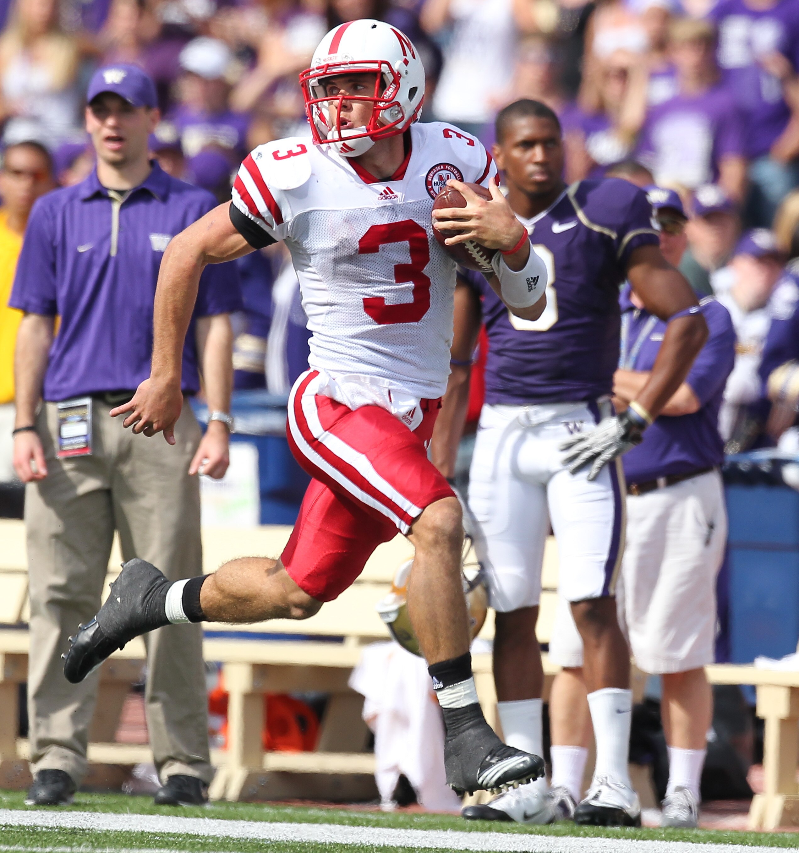 SEATTLE - SEPTEMBER 18: Quarterback Taylor Martinez #3 of the Nebraska Cornhuskers rushes for an 80 yard touchdown run in the third quarter against the Washington Huskies on September 18, 2010 at Husky Stadium in Seattle, Washington. The Cornhuskers defea