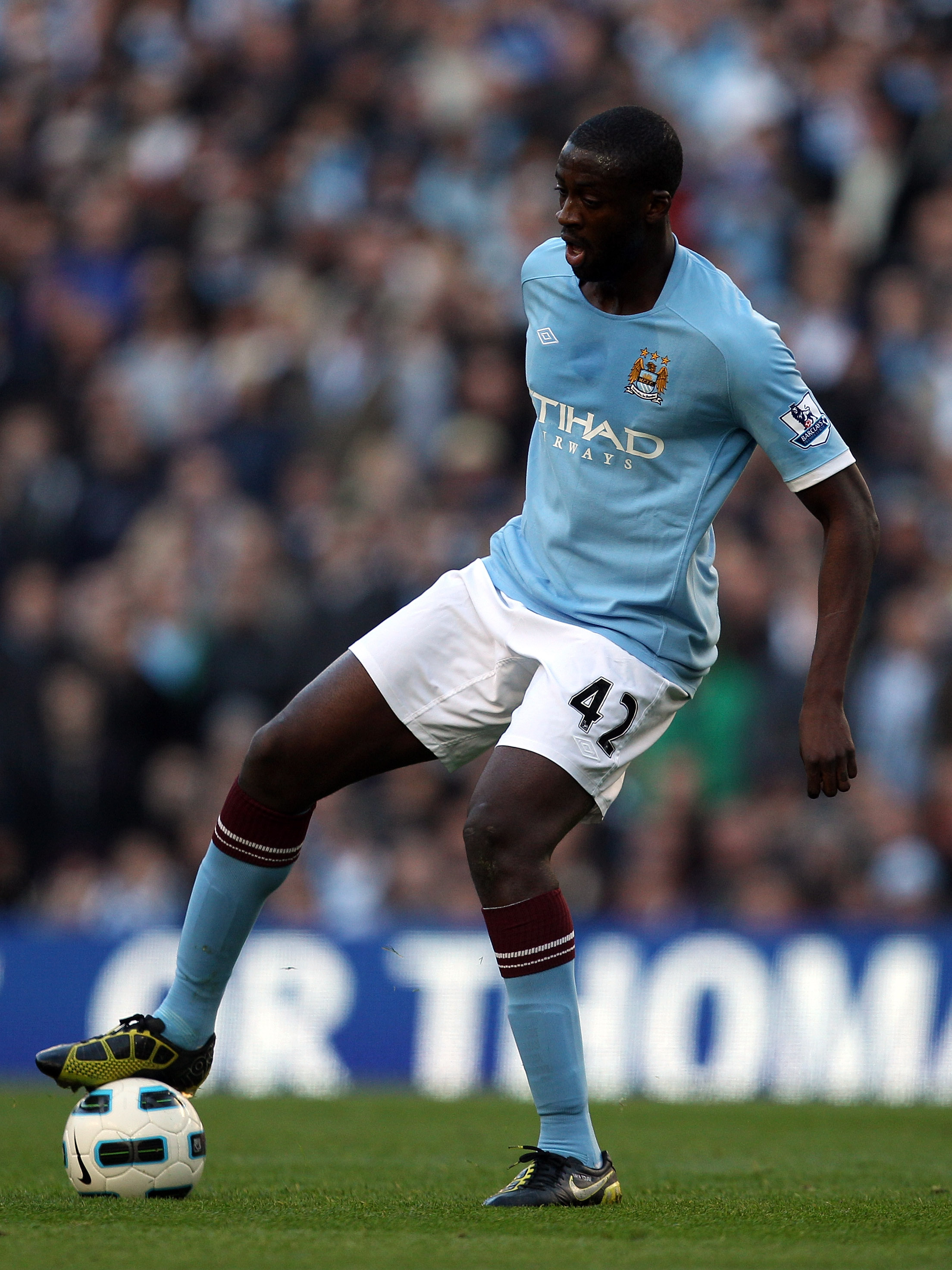 MANCHESTER, ENGLAND - OCTOBER 24:  Yaya Toure in action during the Barclays Premier League match between Manchester City and Arsenal at City of Manchester Stadium on October 24, 2010 in Manchester, England.  (Photo by Richard Heathcote/Getty Images)