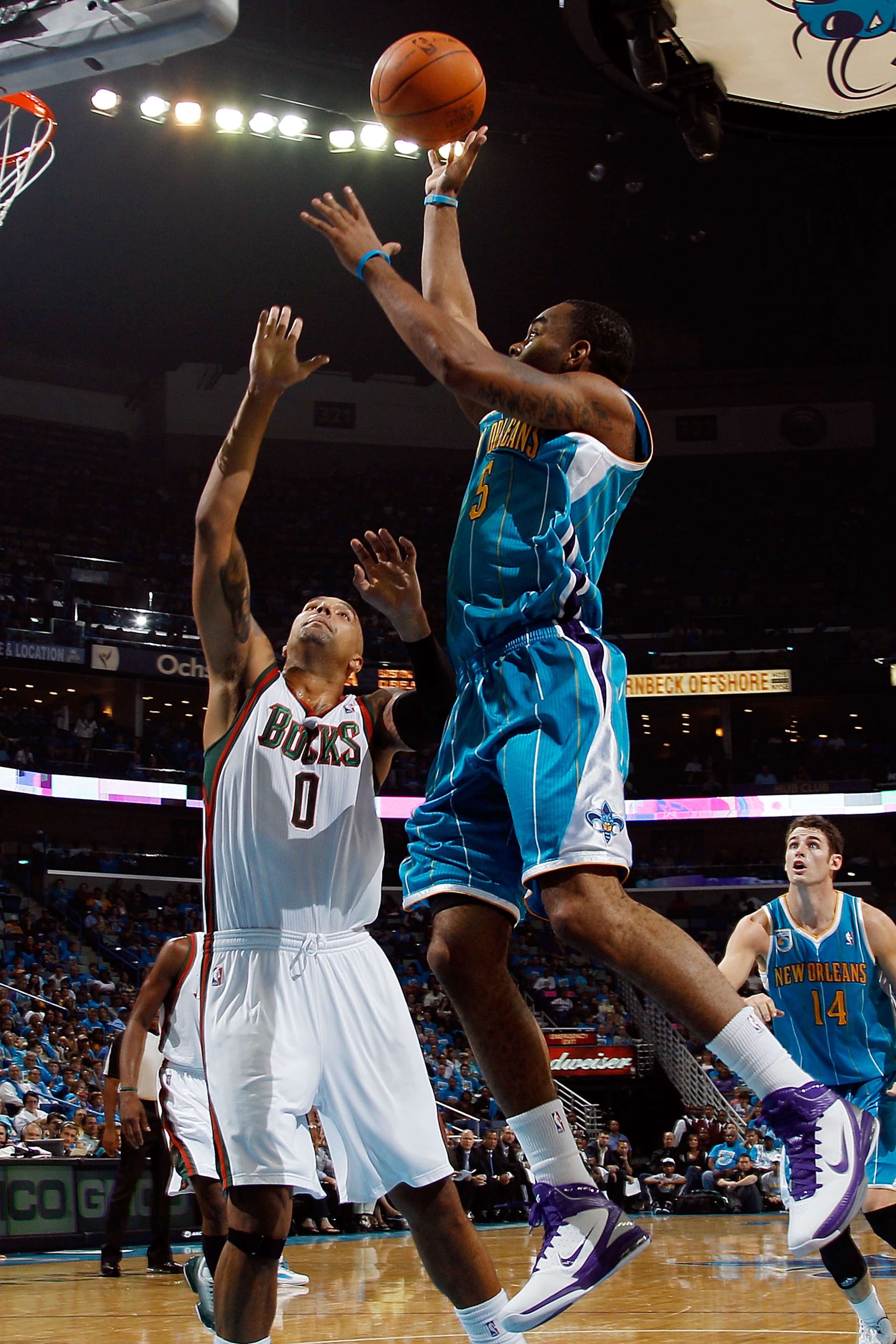 NEW ORLEANS - OCTOBER 27:  Marcus Thornton #5 of the New Orleans Hornets shoots the ball over Drew Gooden #0 of the Milwaukee Bucks at the New Orleans Arena on October 27, 2010 in New Orleans, Louisiana.  NOTE TO USER: User expressly acknowledges and agre