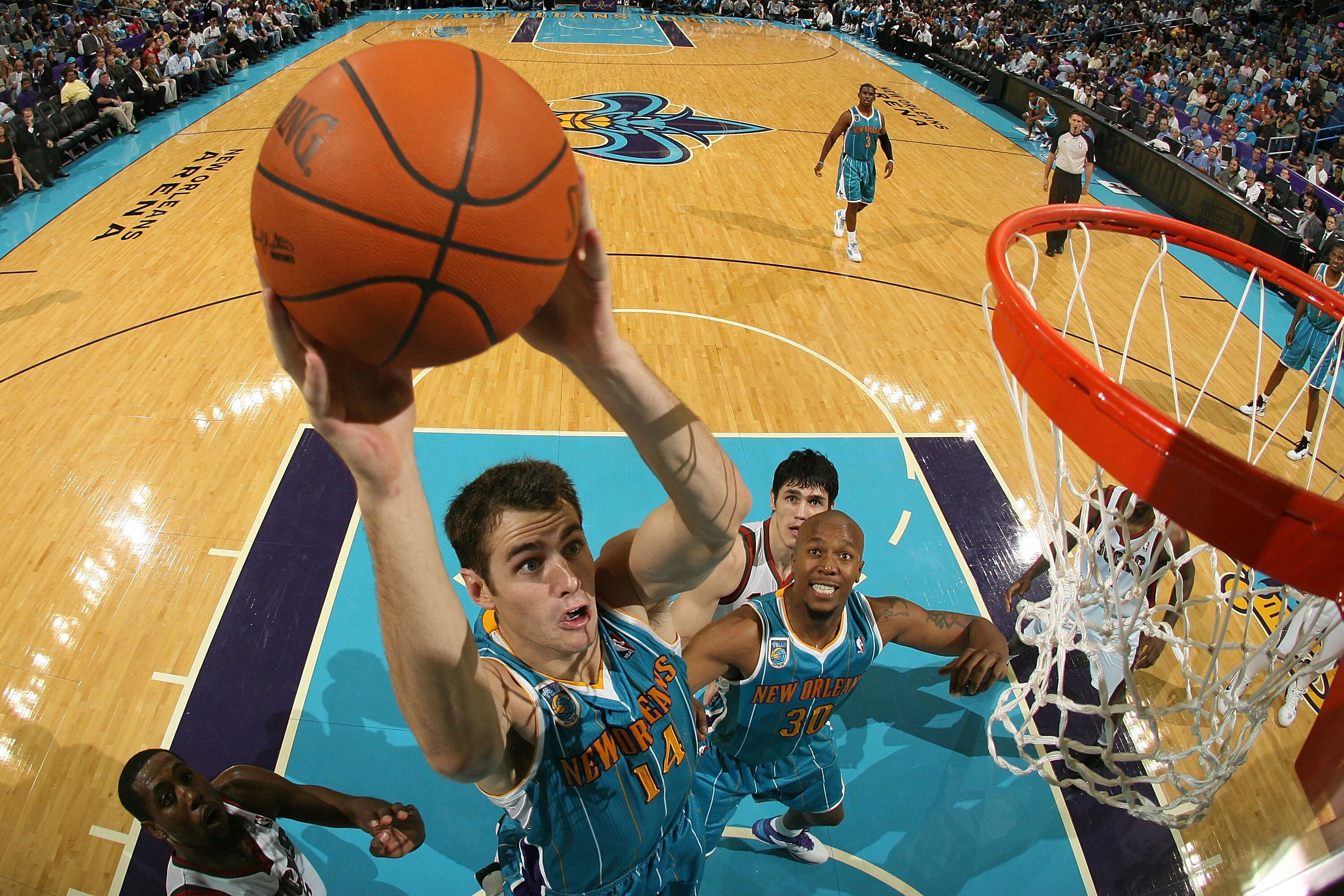 NEW ORLEANS - OCTOBER 27:  Jason Smith #14 of the New Orleans Hornets dunks the ball during the game against the Milwaukee Bucks at the New Orleans Arena on October 27, 2010 in New Orleans, Louisiana.   The Hornets defeated the Bucks 95-91.   NOTE TO USER