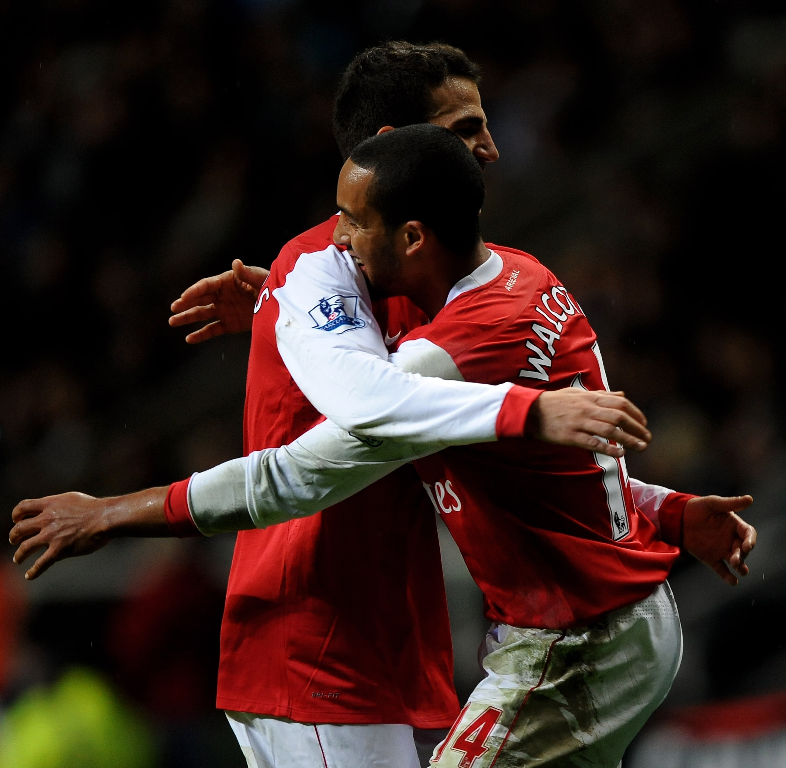 NEWCASTLE UPON TYNE, ENGLAND - OCTOBER 27: Theo Walcott of Arsenal celebrates scoring his team's fourth goal with team mate Cesc Fabregas during the Carling Cup Fourth Round match between Newcastle United and Arsenal at St James' Park on October 27, 2010 NEWCASTLE UPON TYNE, ENGLAND - OCTOBER 27: Theo Walcott of Arsenal celebrates scoring his team's fourth goal with team mate Cesc Fabregas during the Carling Cup Fourth Round match between Newcastle United and Arsenal at St James' Park on October 27, 2010