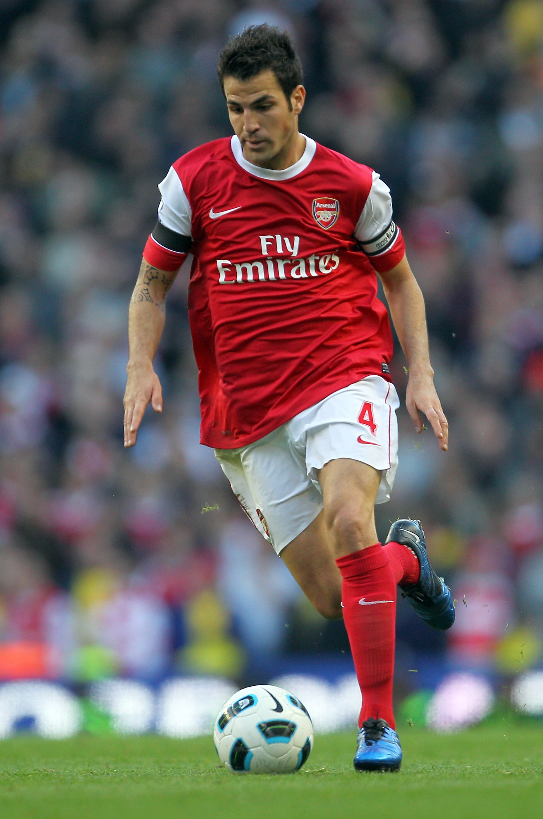 MANCHESTER, ENGLAND - OCTOBER 24: Cesc Fabregas of Arsenal in action during the Barclays Premier League match between Manchester City and Arsenal at City of Manchester Stadium on October 24, 2010 in Manchester, England. (Photo by Clive Rose/Getty Images MANCHESTER, ENGLAND - OCTOBER 24: Cesc Fabregas of Arsenal in action during the Barclays Premier League match between Manchester City and Arsenal at City of Manchester Stadium on October 24, 2010 in Manchester, England. (Photo by Clive Rose/Getty Images