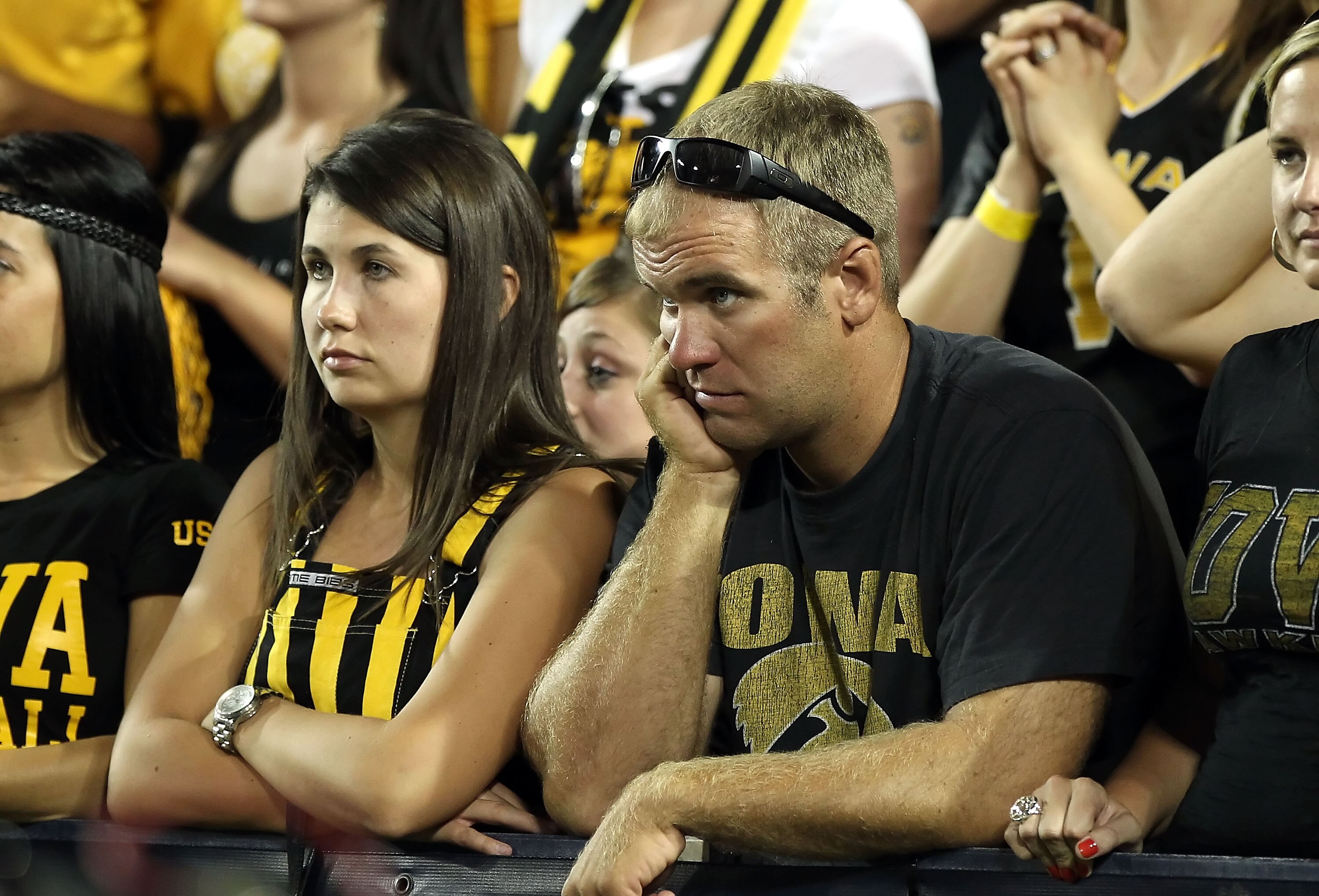 TUCSON, AZ - SEPTEMBER 18:  Fans of the Iowa Hawkeyes react in the final moments of the college football game against the Arizona Wildcats at Arizona Stadium on September 18, 2010 in Tucson, Arizona.  The Wildcats defeated the Hawkeyes 34-27.  (Photo by C