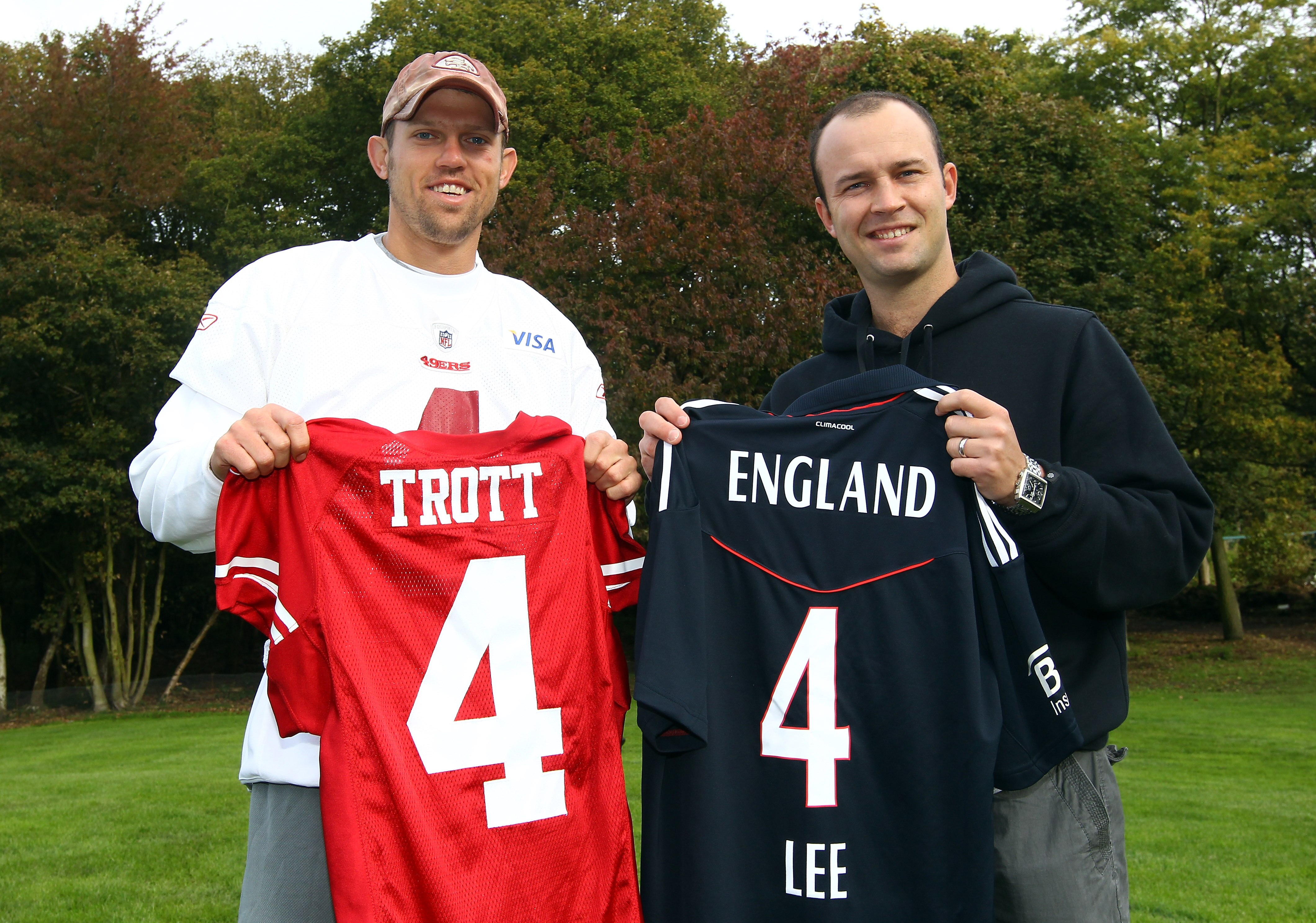 HERTFORD, ENGLAND - OCTOBER 27:  Andy Lee of San Francisco 49ers meets Jonathan Trott from the England Cricket team outside The Grove Hotel on October 27, 2010 in Hertford, England. The San Francisco 49ers will meet the Denver Broncos in the NFL Internati