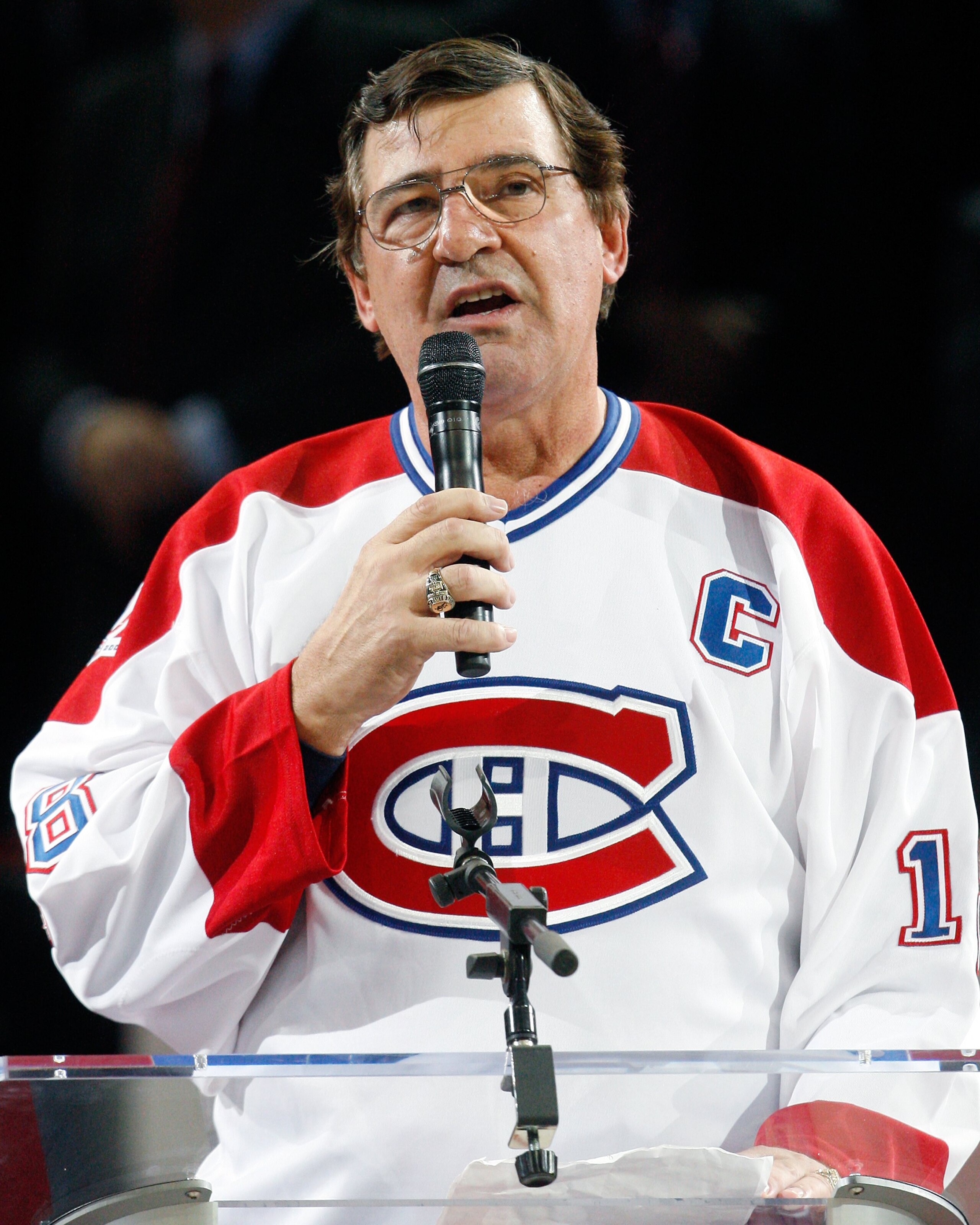 MONTREAL- DECEMBER 4: Former Montreal Canadien Serge Savard speaks to fans during the Centennial Celebration ceremonies prior to the NHL game between the Montreal Canadiens and Boston Bruins on December 4, 2009 at the Bell Centre in Montreal, Quebec, Can MONTREAL- DECEMBER 4: Former Montreal Canadien Serge Savard speaks to fans during the Centennial Celebration ceremonies prior to the NHL game between the Montreal Canadiens and Boston Bruins on December 4, 2009 at the Bell Centre in Montreal, Quebec, Can