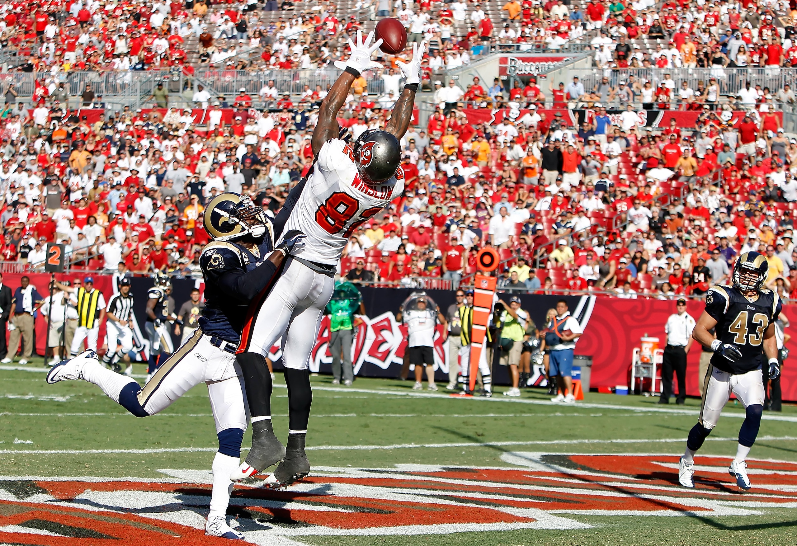 TAMPA, FL - OCTOBER 24:  Tightend Kellen Winslow #82 of the Tampa Bay Buccaneers cannot bring in this pass as safety Oshiomogho Atogwe #21 of the St. Louis Rams breaks it up during the game at Raymond James Stadium on October 24, 2010 in Tampa, Florida.