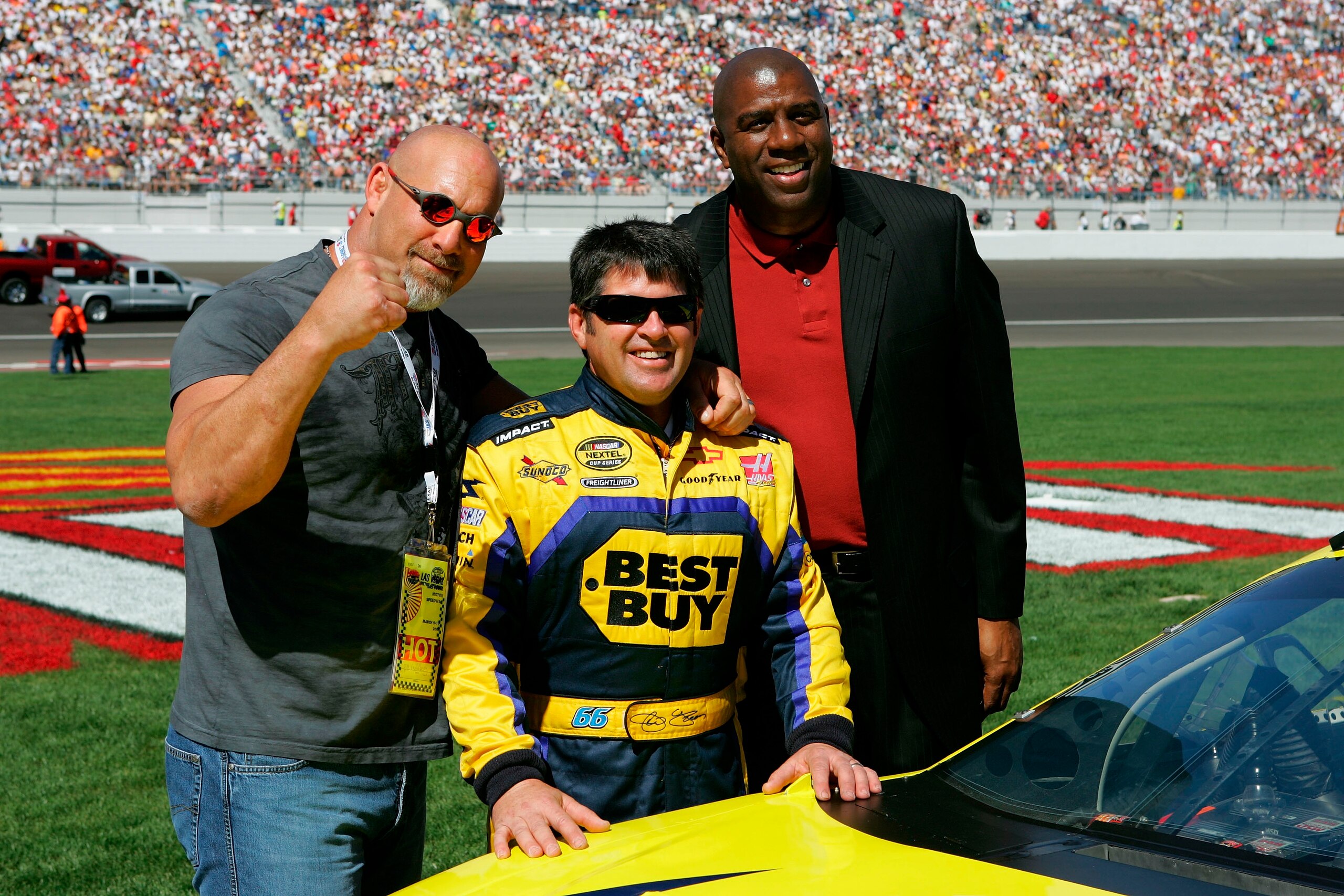 lLAS VEGAS - MARCH 11:  Former wrestler Bill Goldberg, Jeff Green, driver of the #66 Best Buy Chevrolet, and Hallof Fame basketball player Earvin Magic Johnson, prior to the NASCAR Nextel Cup Series UAW-DaimlerChrysler 400 at Las Vegas Motor Speedway on M