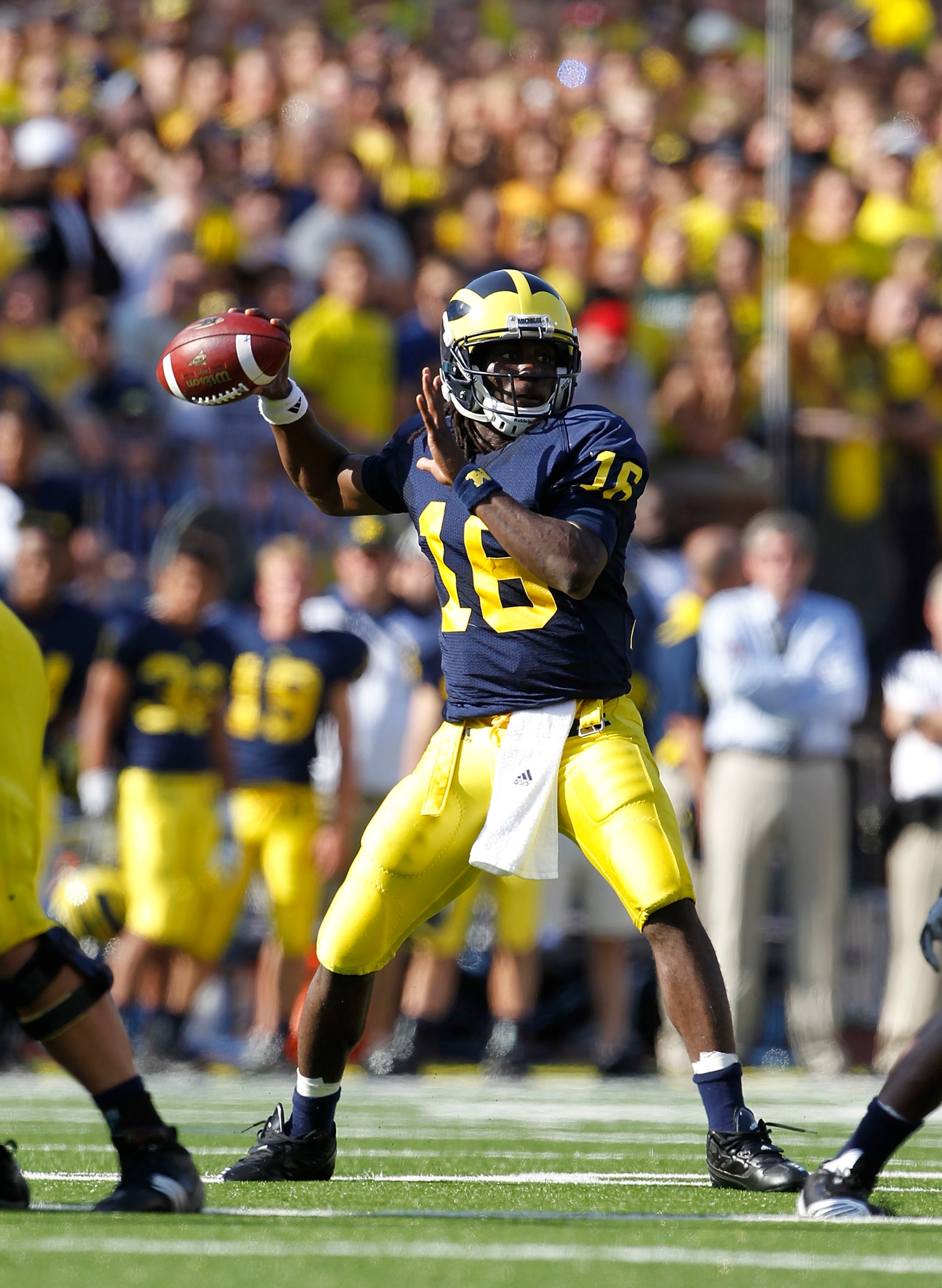 ANN ARBOR, MI - OCTOBER 09: Denard Robinson #16 of the Michigan Wolverines drops back to pass in the second quarter during the game against the Michigan State Spartans on October 9, 2010 at Michigan Stadium in Ann Arbor, Michigan. (Photo by Leon Halip/Get