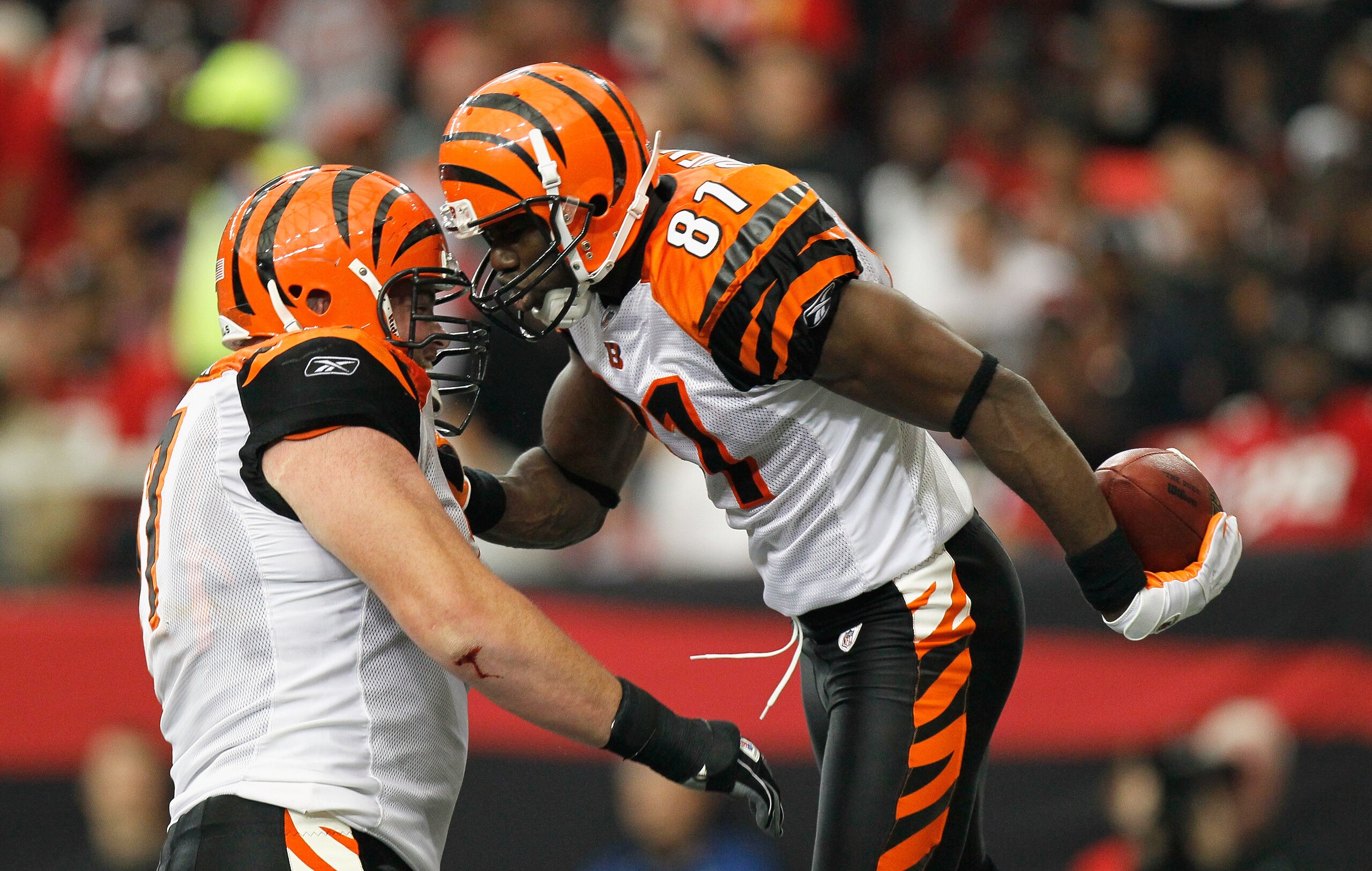 ATLANTA - OCTOBER 24:  Terrell Owens #81 of the Cincinnati Bengals celebrates his touchdown against the Atlanta Falcons with Andrew Whitworth #77 at Georgia Dome on October 24, 2010 in Atlanta, Georgia.  (Photo by Kevin C. Cox/Getty Images)
