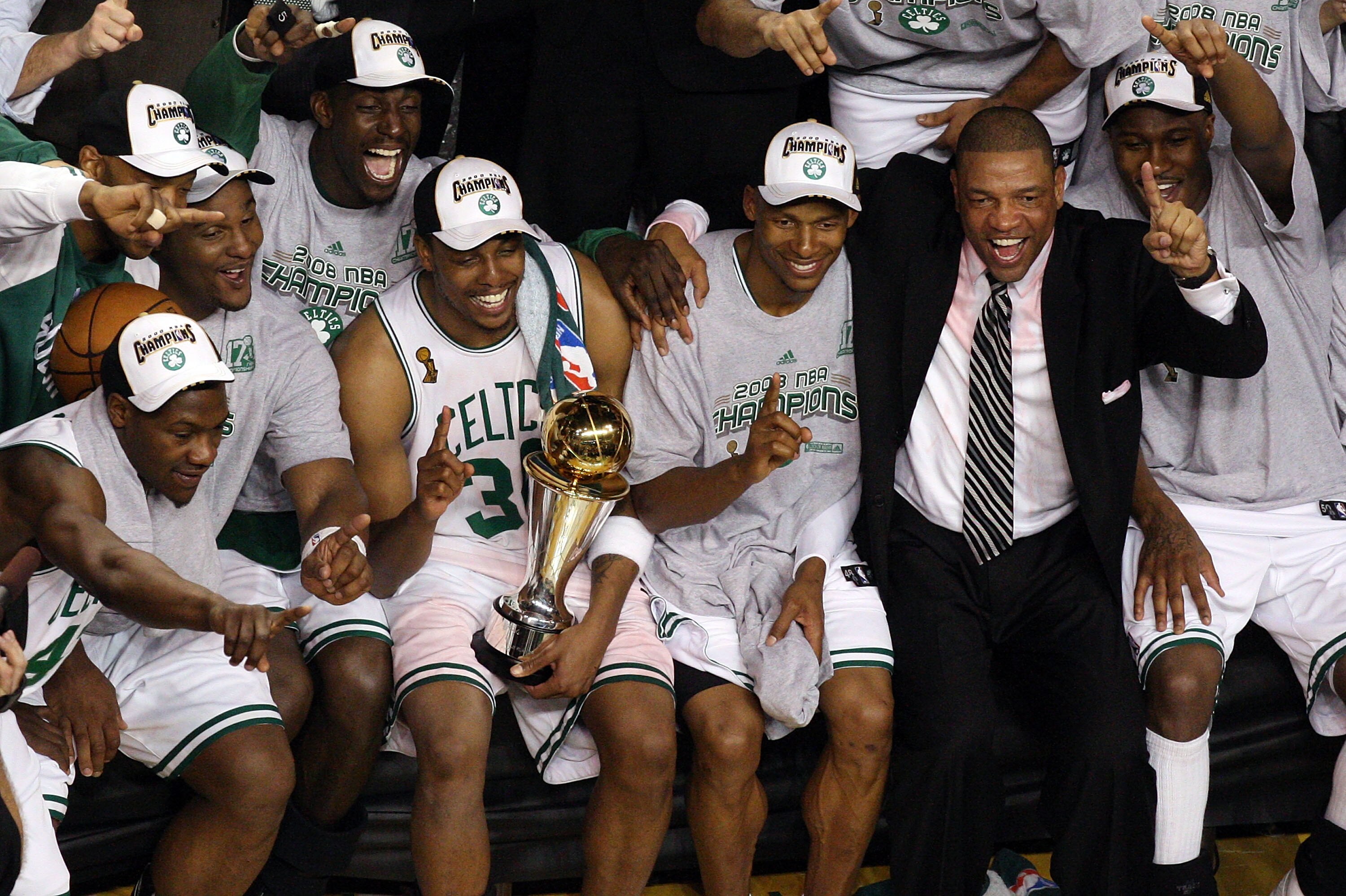 BOSTON - JUNE 17:  (L-R) Glen Davis #11, Kevin Garnett #5, Paul Pierce #34, Ray Allen #20 and head coach Doc Rivers of the Boston Celtics celebrate after defeating the Los Angeles Lakers in Game Six of the 2008 NBA Finals on June 17, 2008 at TD Banknorth 