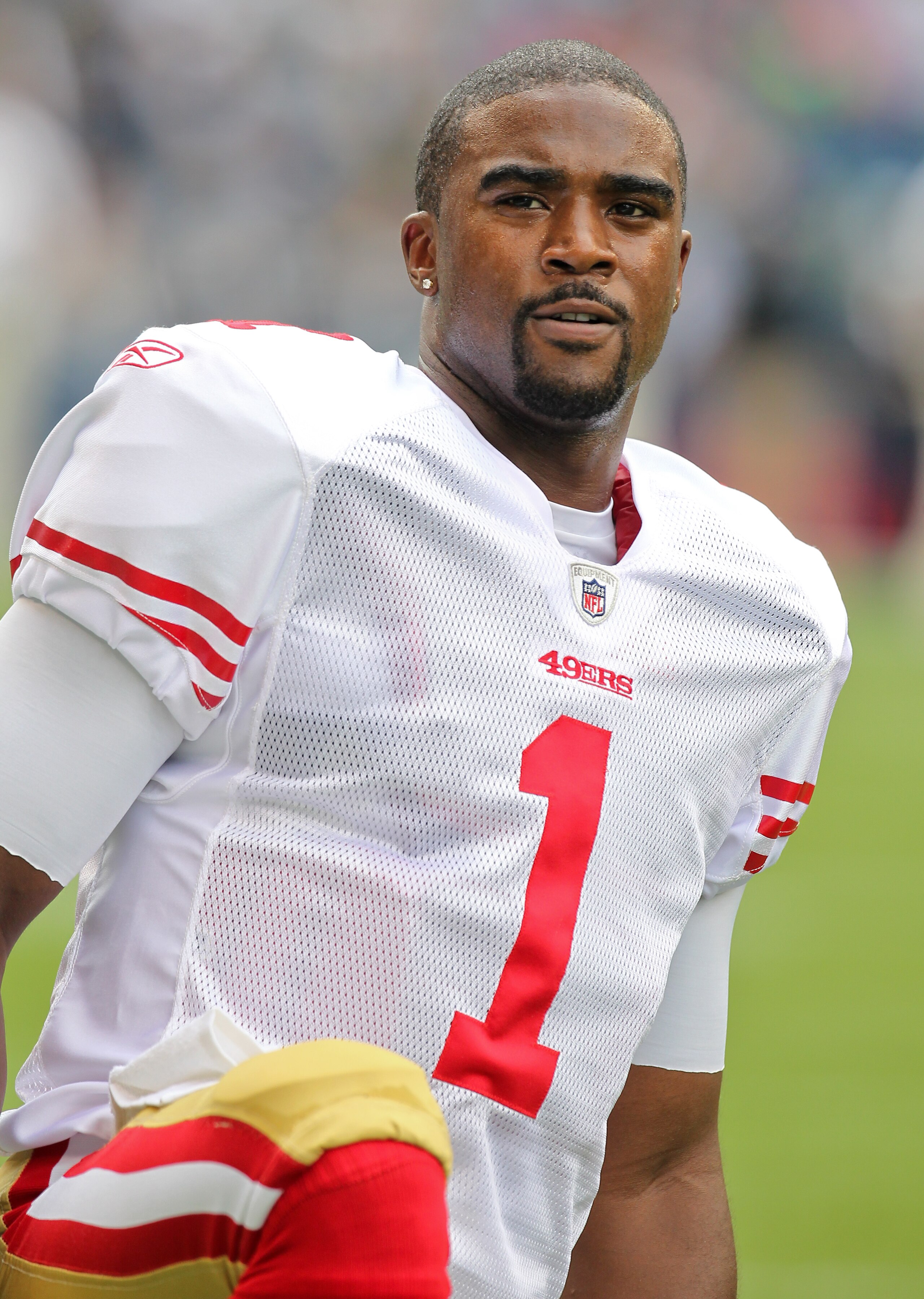 SEATTLE - SEPTEMBER 12: Quarterback Troy Smith #1 of the San Francisco 49ers looks on during warm ups prior to the NFL season opener against the Seattle Seahawks at Qwest Field on September 12, 2010 in Seattle, Washington. (Photo by Otto Greule Jr/Getty SEATTLE - SEPTEMBER 12: Quarterback Troy Smith #1 of the San Francisco 49ers looks on during warm ups prior to the NFL season opener against the Seattle Seahawks at Qwest Field on September 12, 2010 in Seattle, Washington. (Photo by Otto Greule Jr/Getty